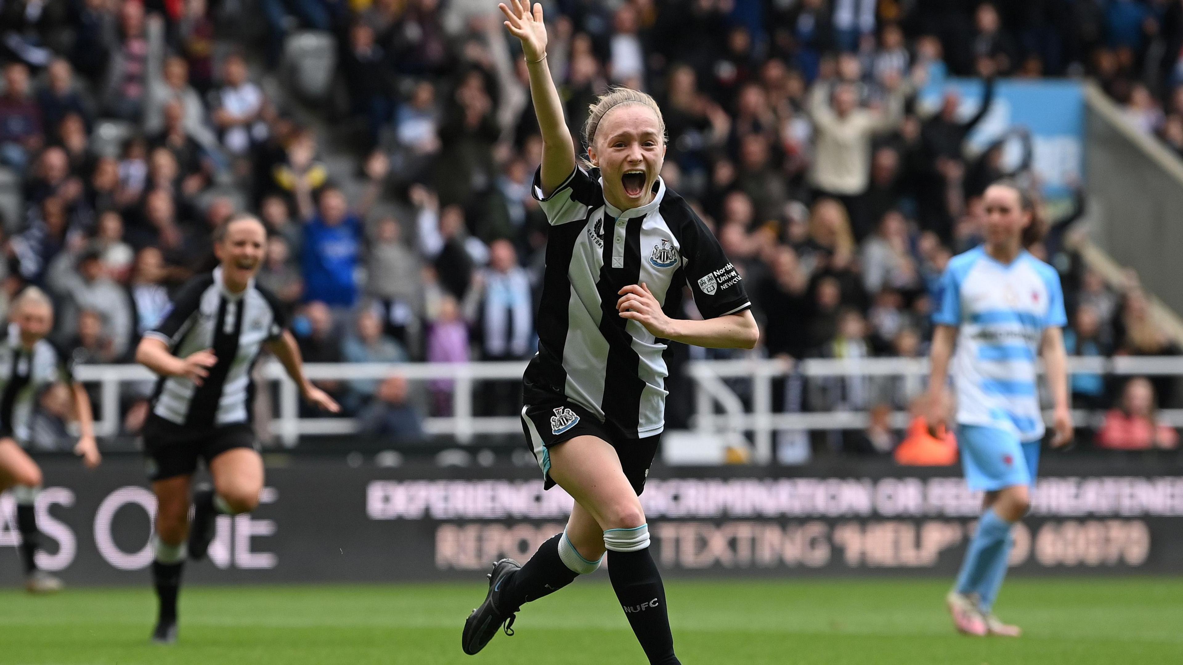 Newcastle striker Katie Barker celebrates after scoring the first goal against Alnwick Town at St James' Park in May 2022