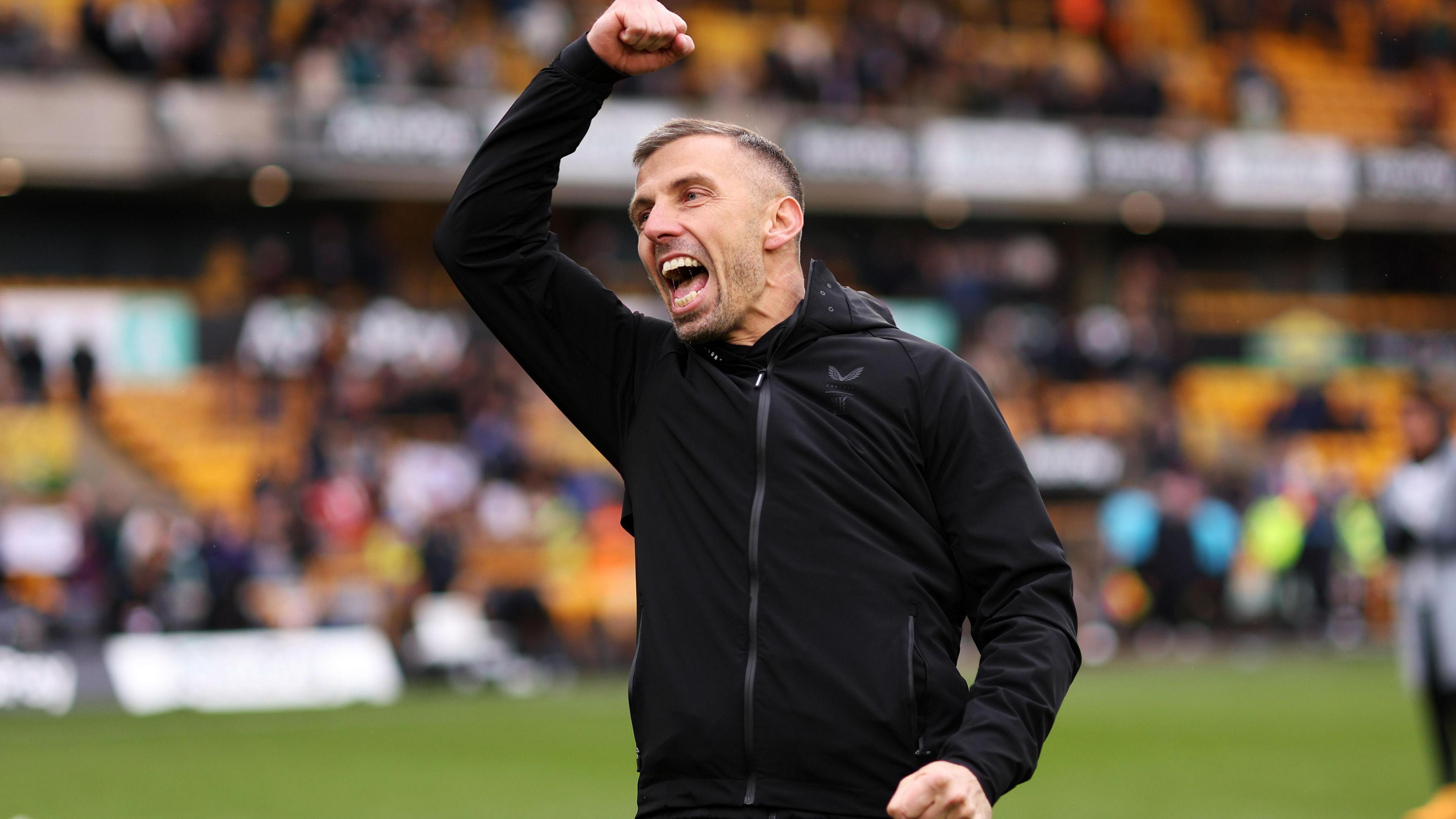 Gary O'Neil celebrating a win at Molineux whil in charge of Wolves