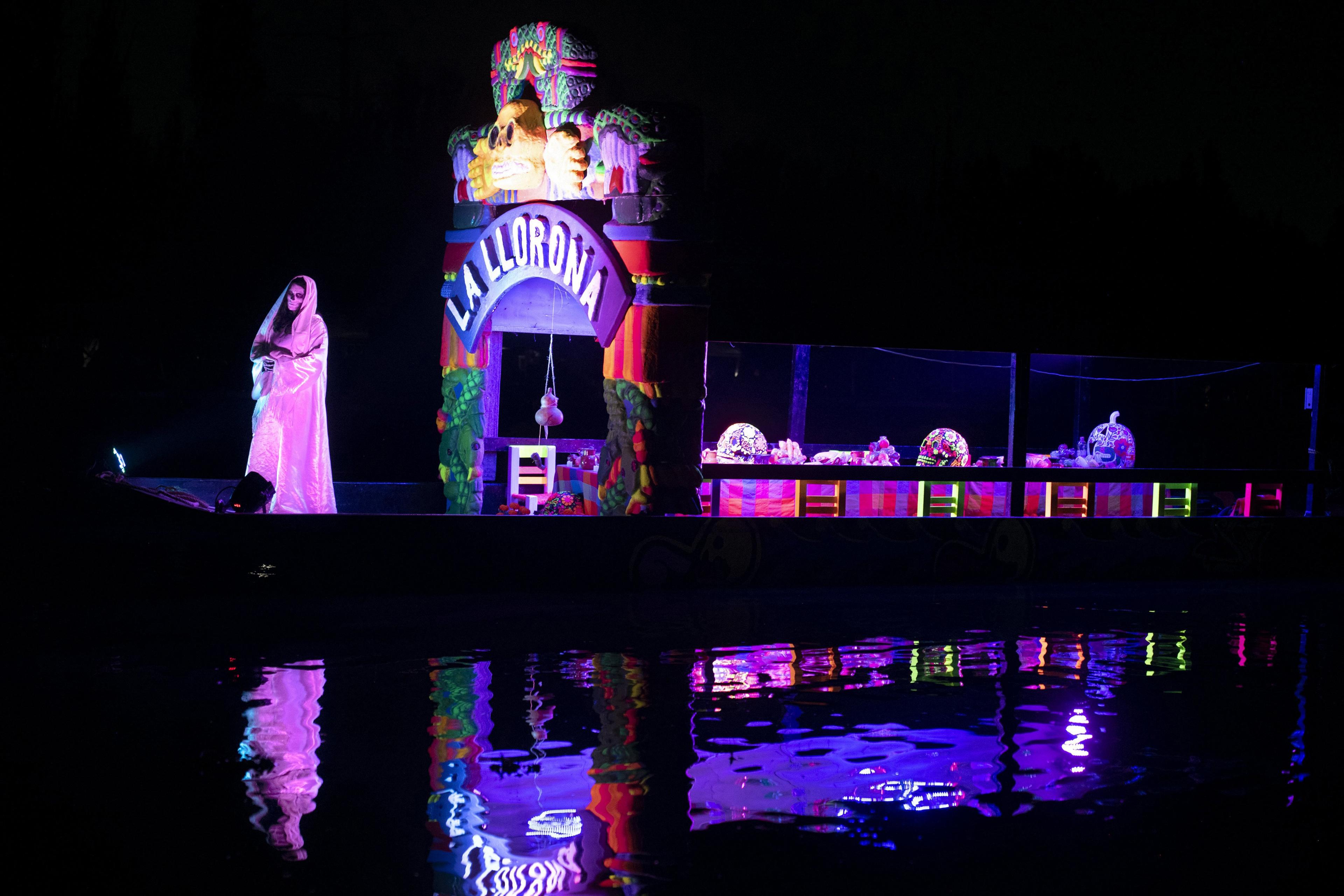 Nayeli Cortes Castillo, an actress, portrays "La Llorona" in Xochimilco.