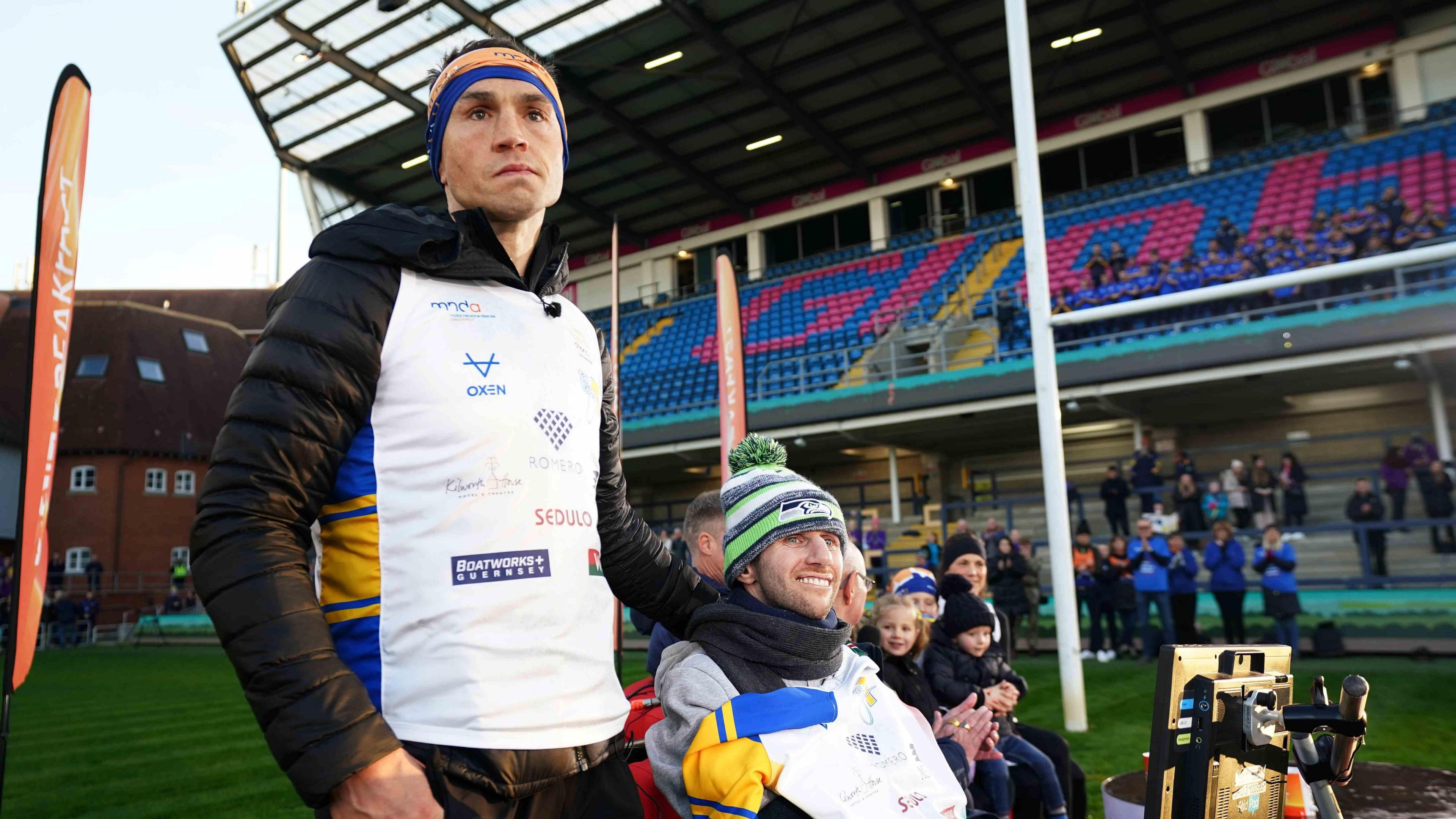 Kevin Sinfield with Rob Burrow on the pitch at Headingley Stadium in Leeds