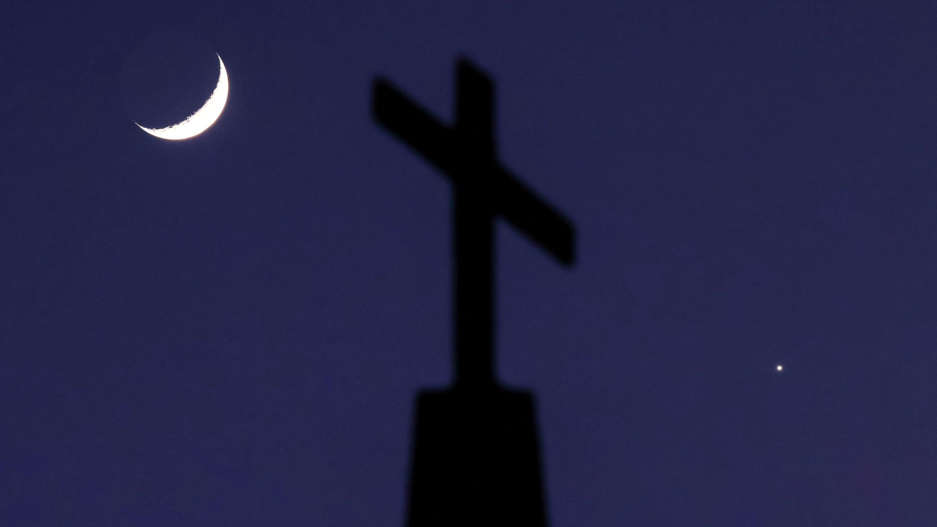 The Moon and Venus either side of a Church in Georgia