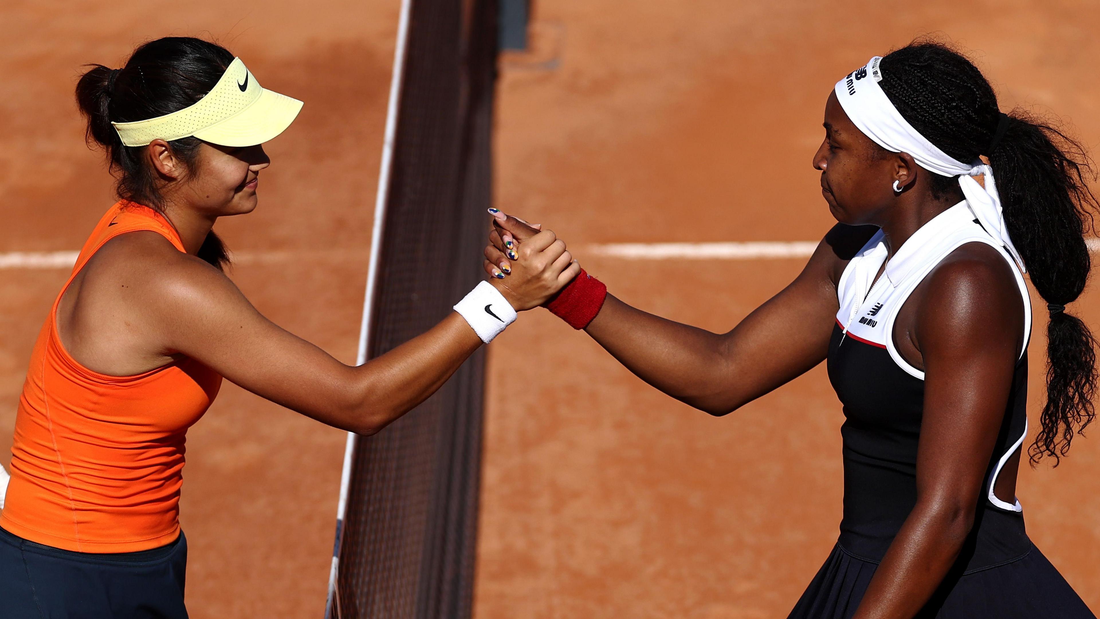 Emma Raducanu and Coco Gauff shake hands at the net after their Italian Open match