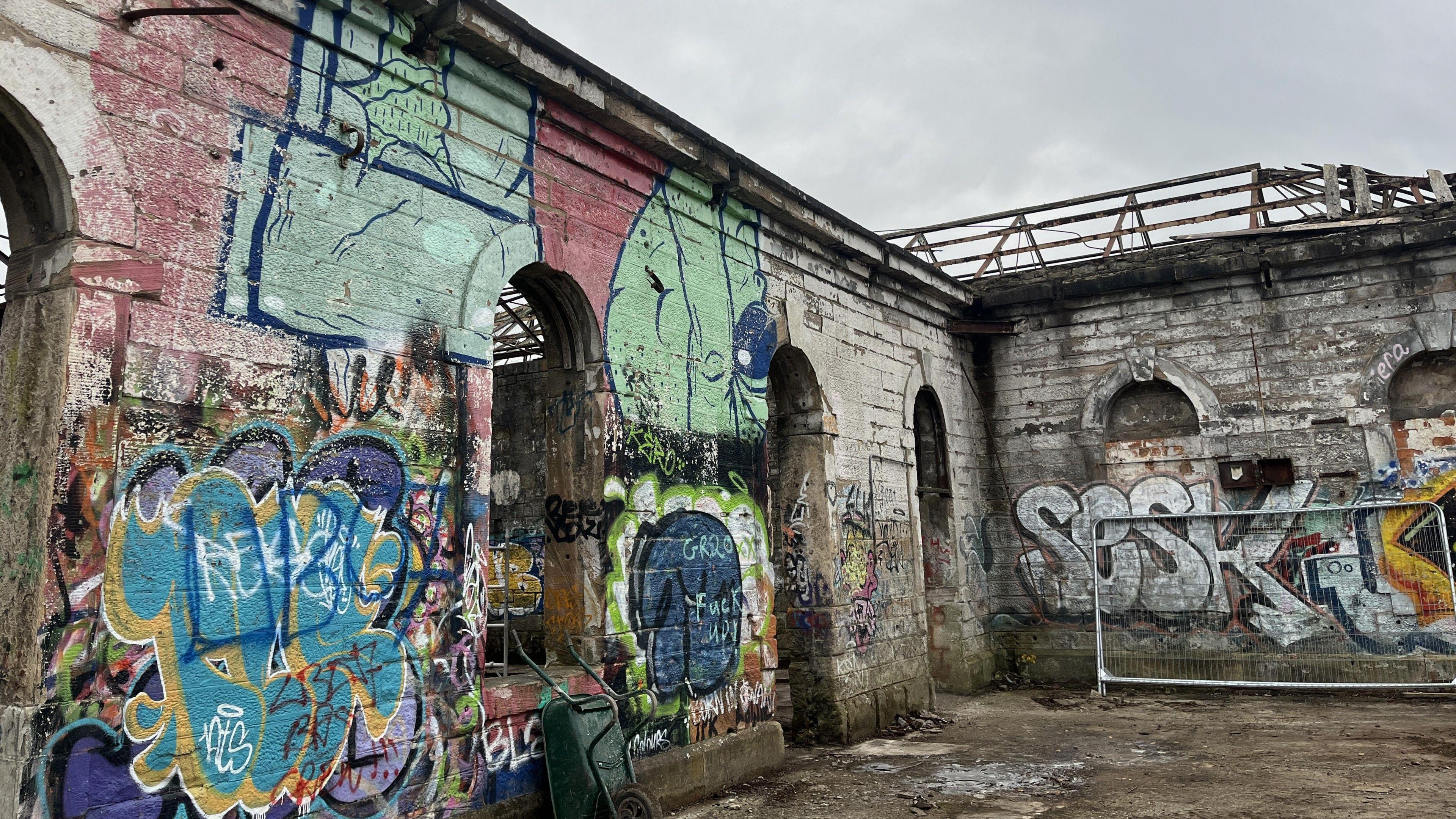 A disused building covered in graffiti