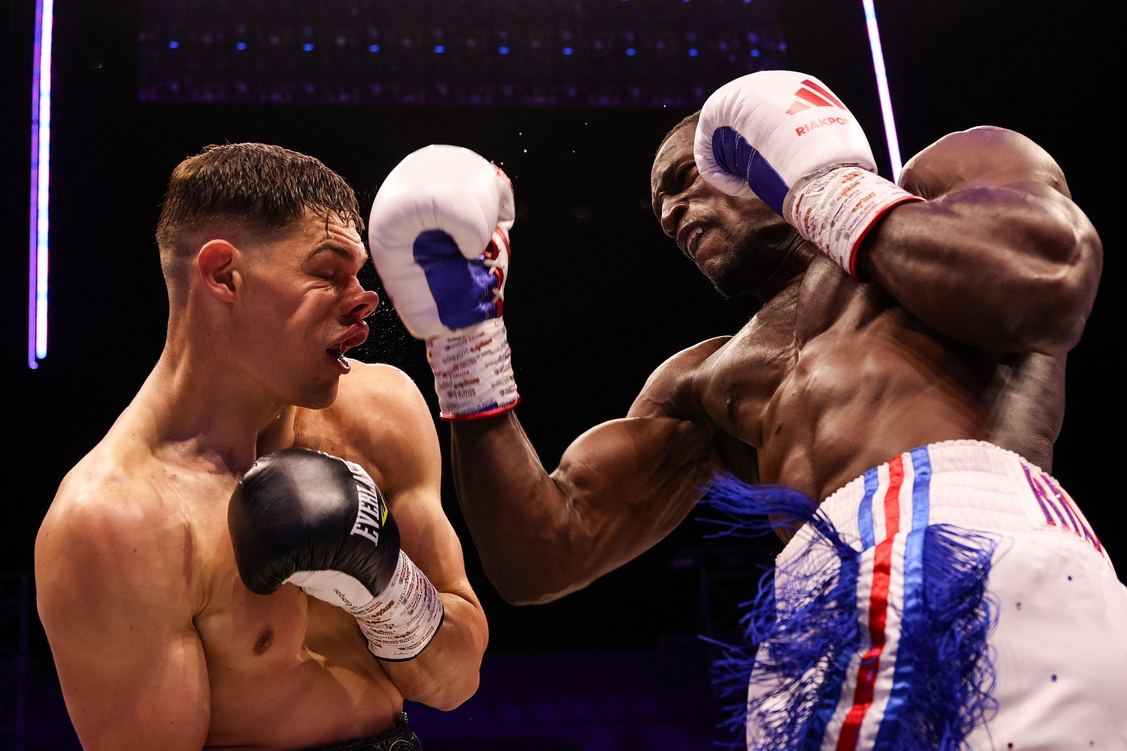 Richard Riakporhe lands an uppercut on Chris Billam-Smith during the WBO cruiserweight title fight at Selhurst Park in London