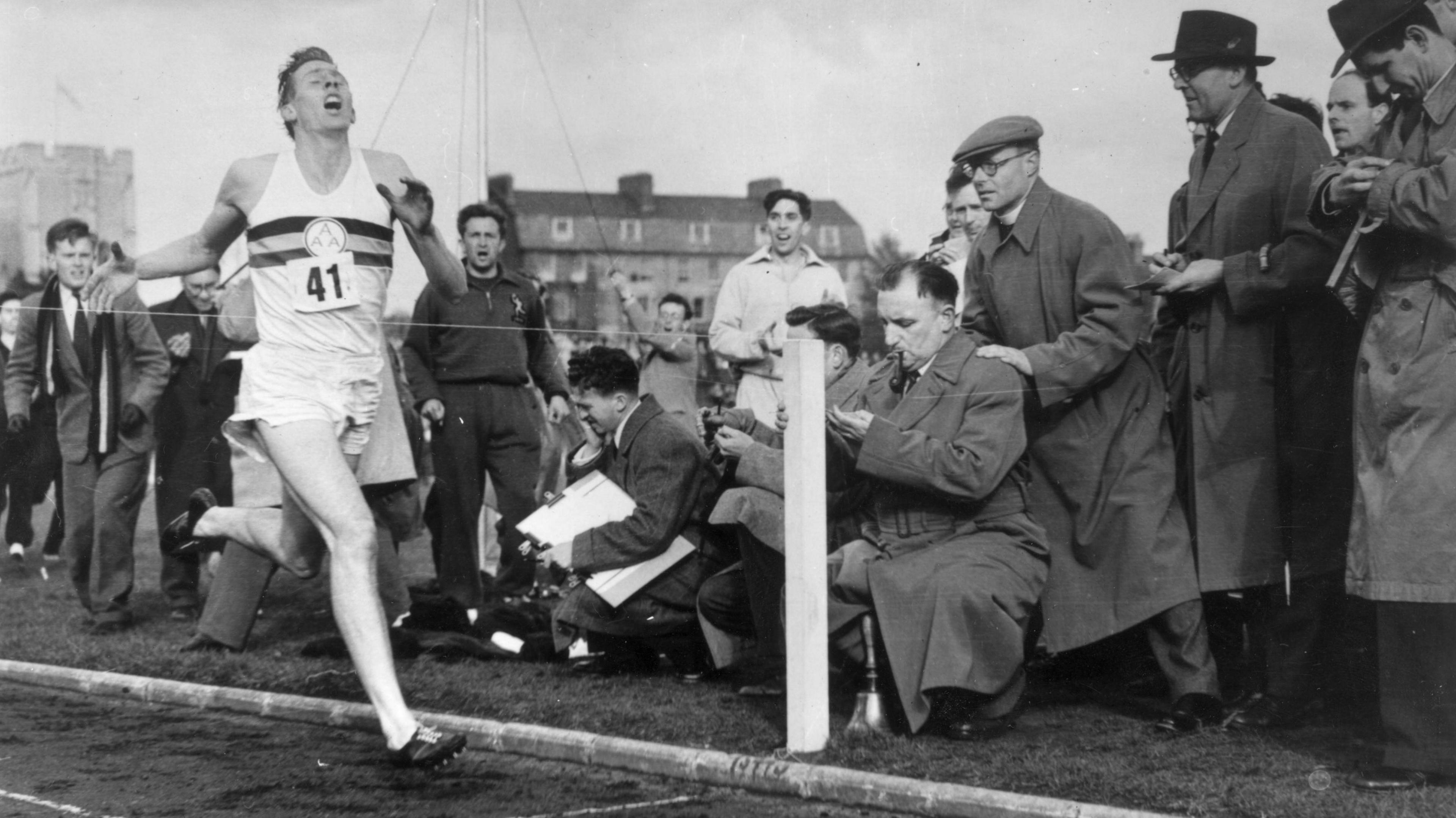 Sir Roger Bannister about to cross the tape at the end of his record breaking mile run at Iffley Road, Oxford in 1954.