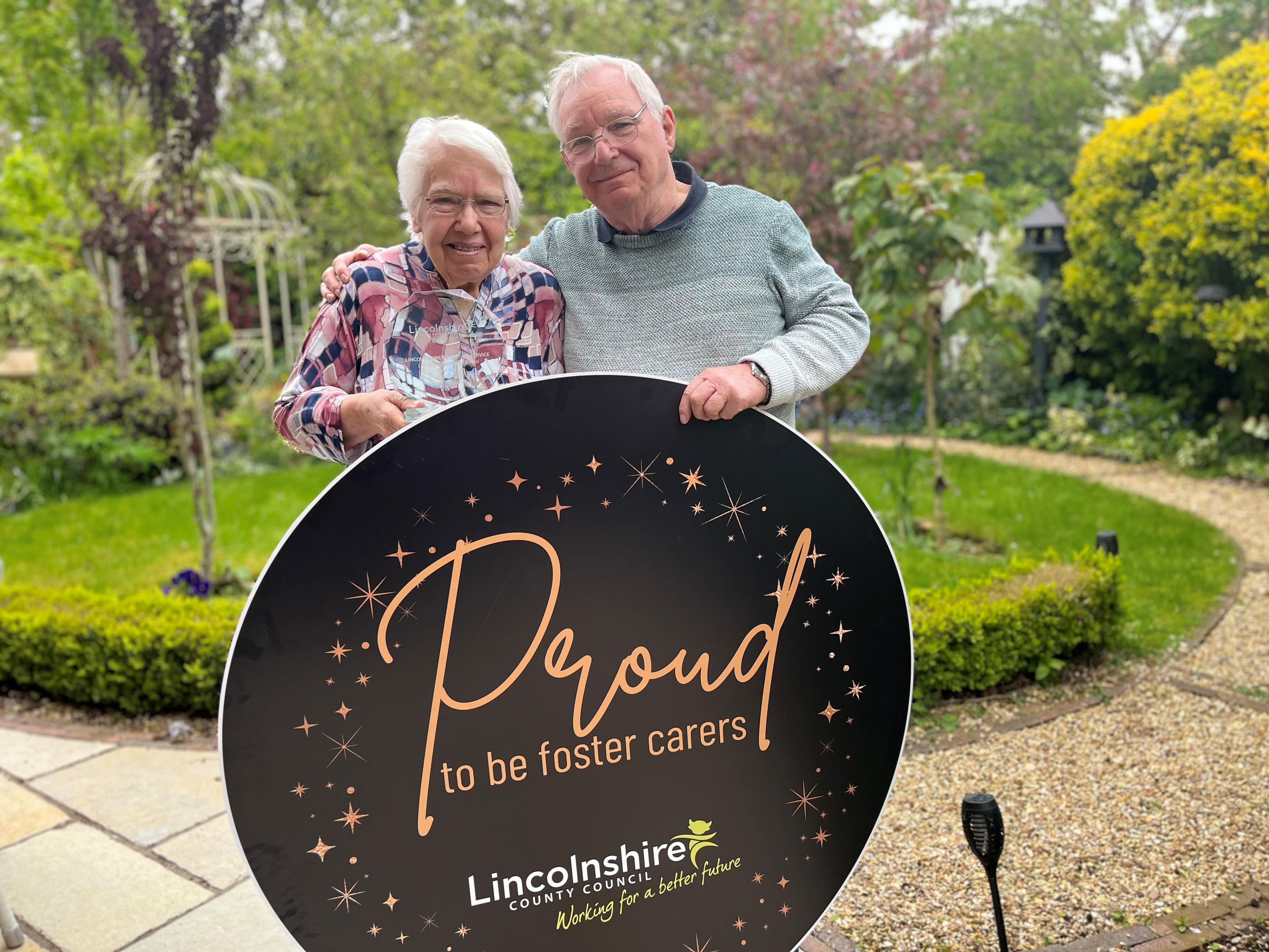 Margaret and Robert Isdale with their award