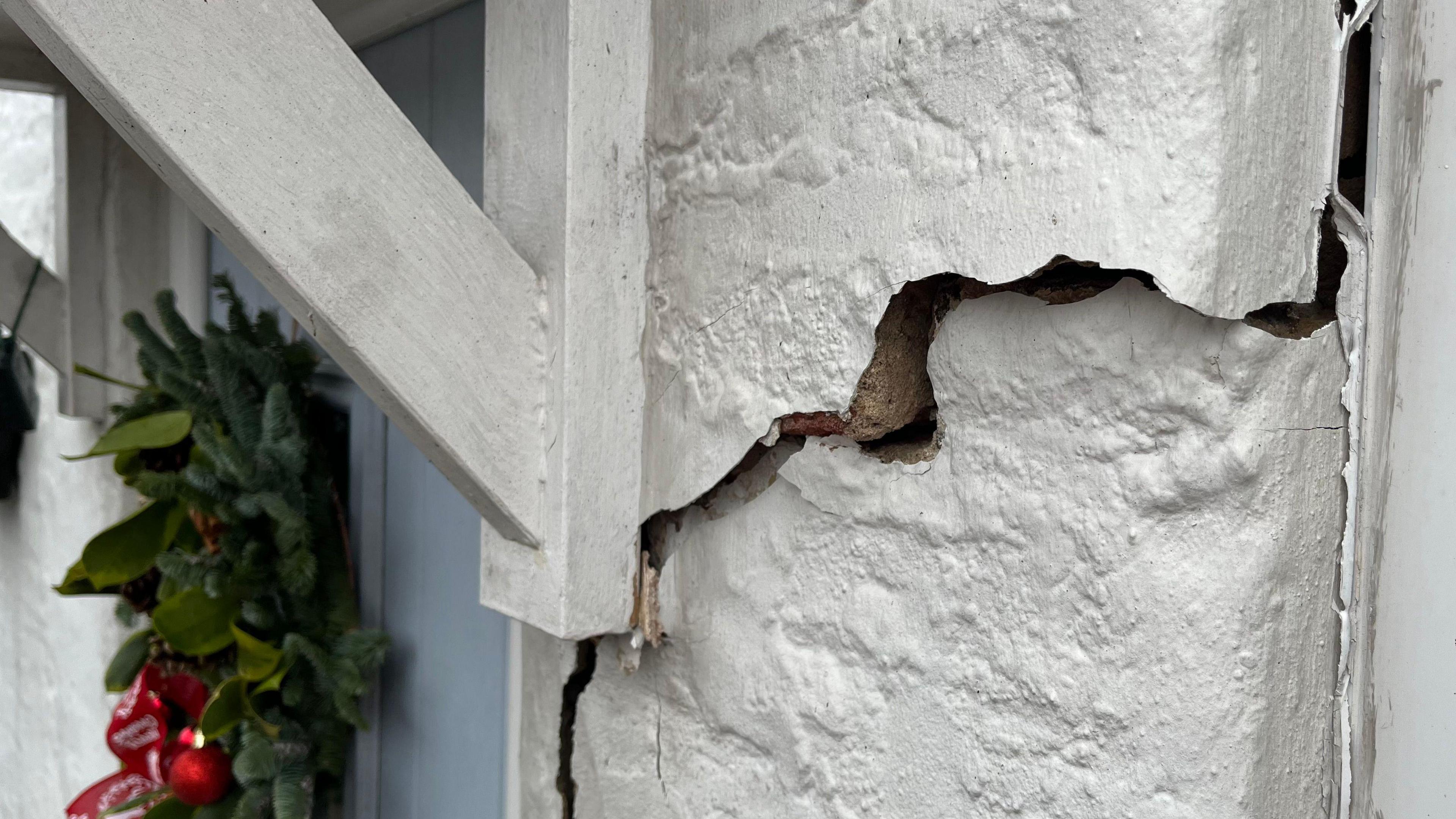 A large crack beside Mr Musgrave's front door