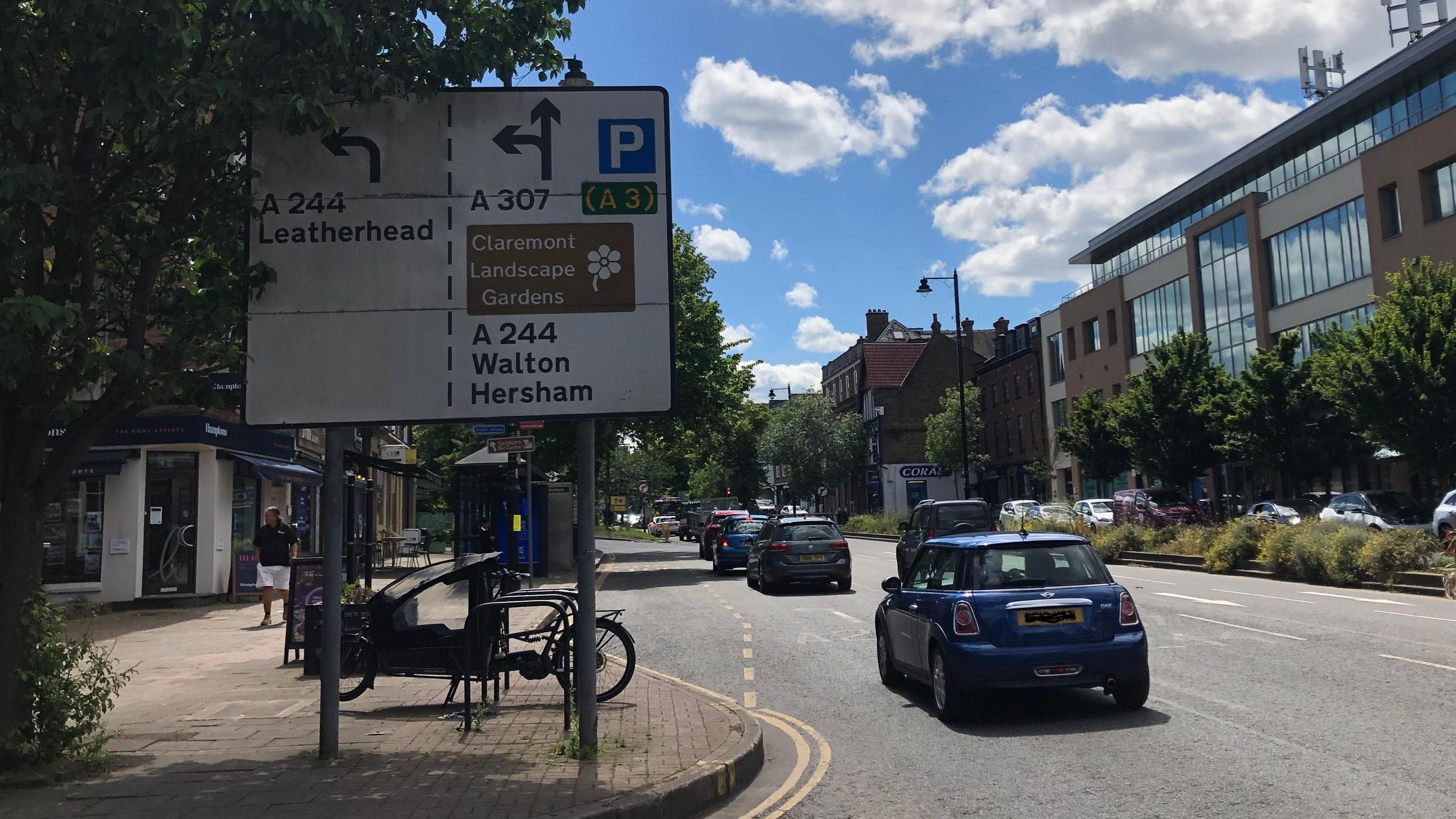 Esher high street, road sign, cars