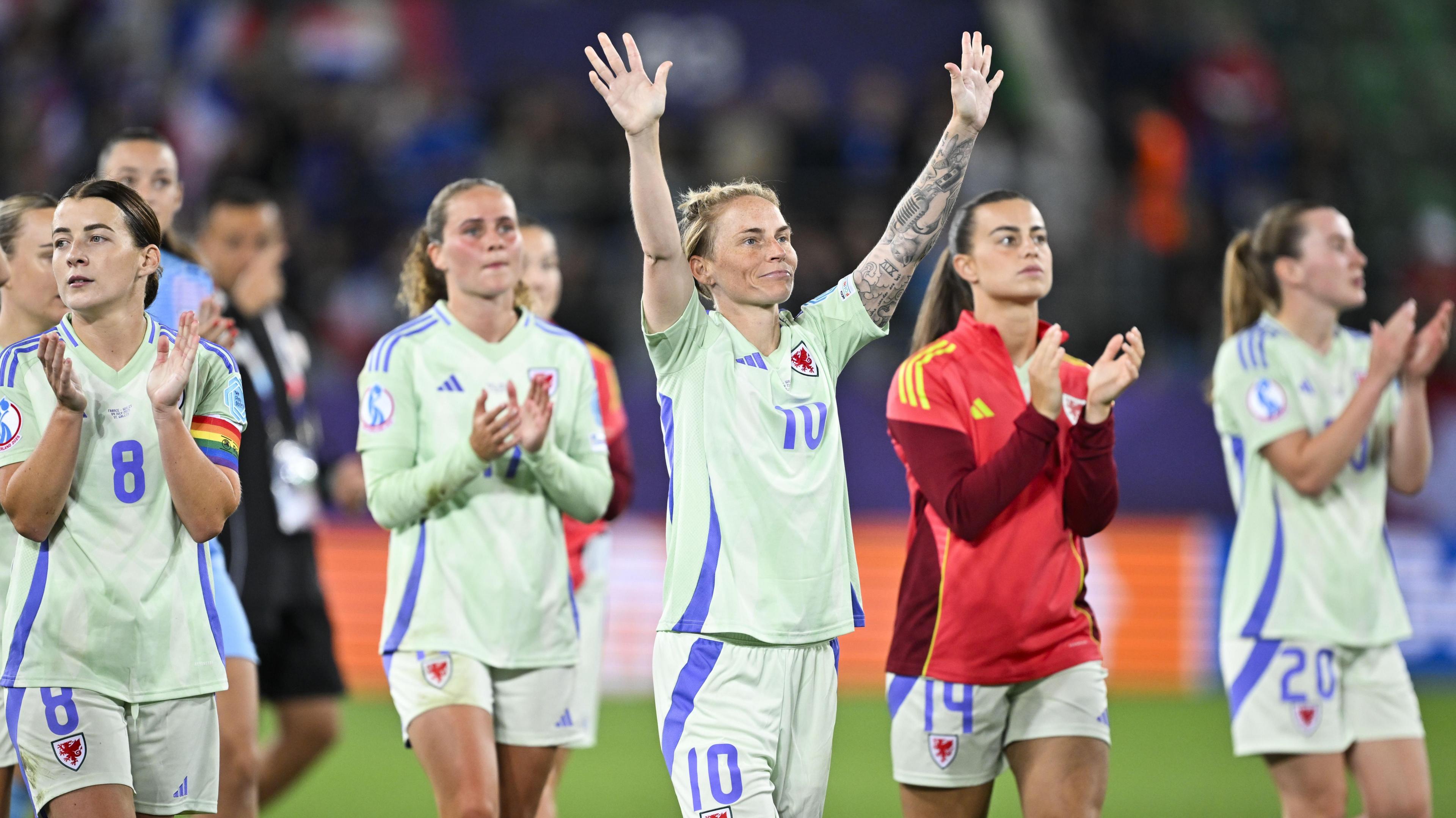 Wales clapping their fans after the match.