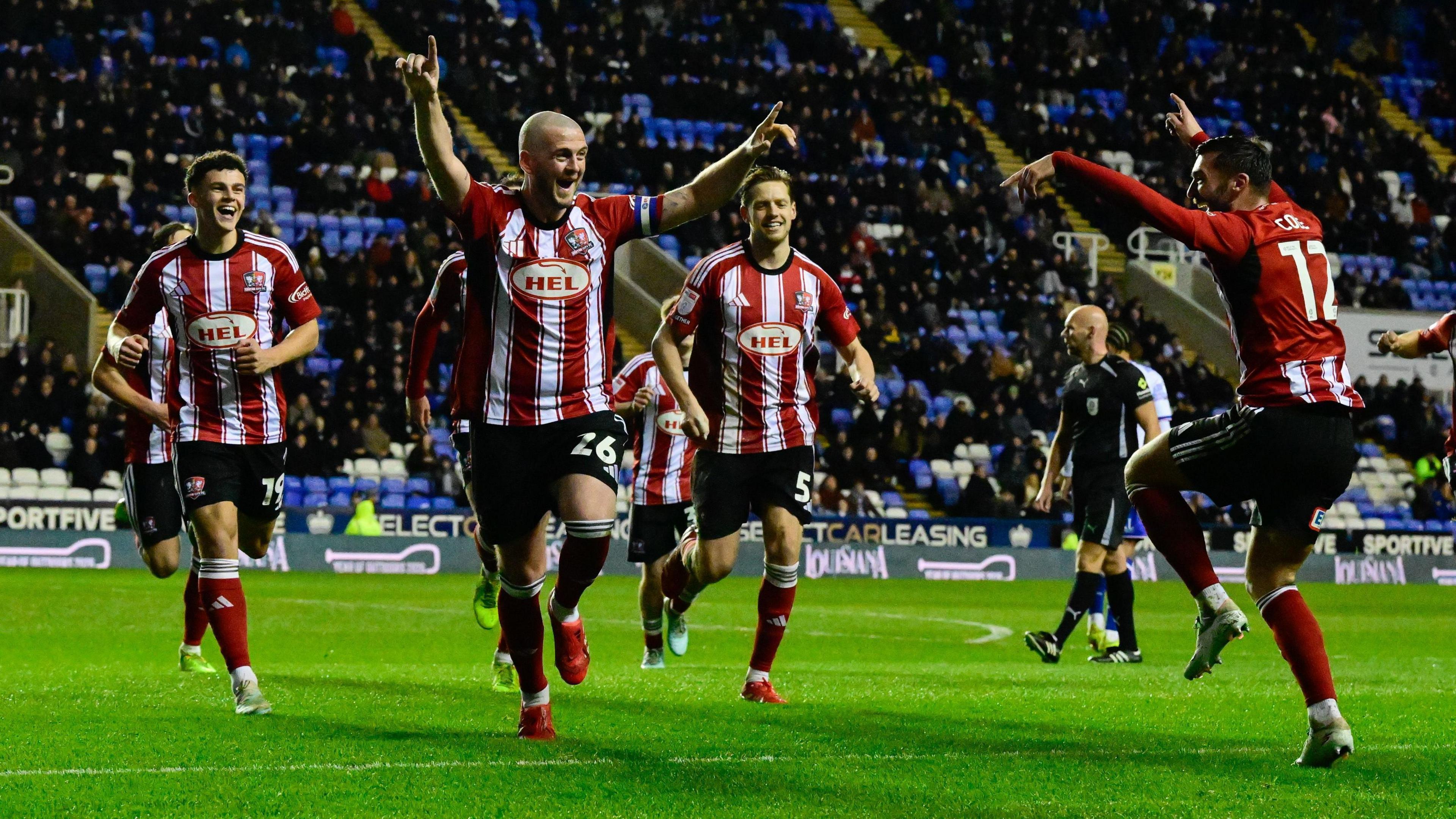 Pierce Sweeney celebrates for Exeter after scoring at Reading