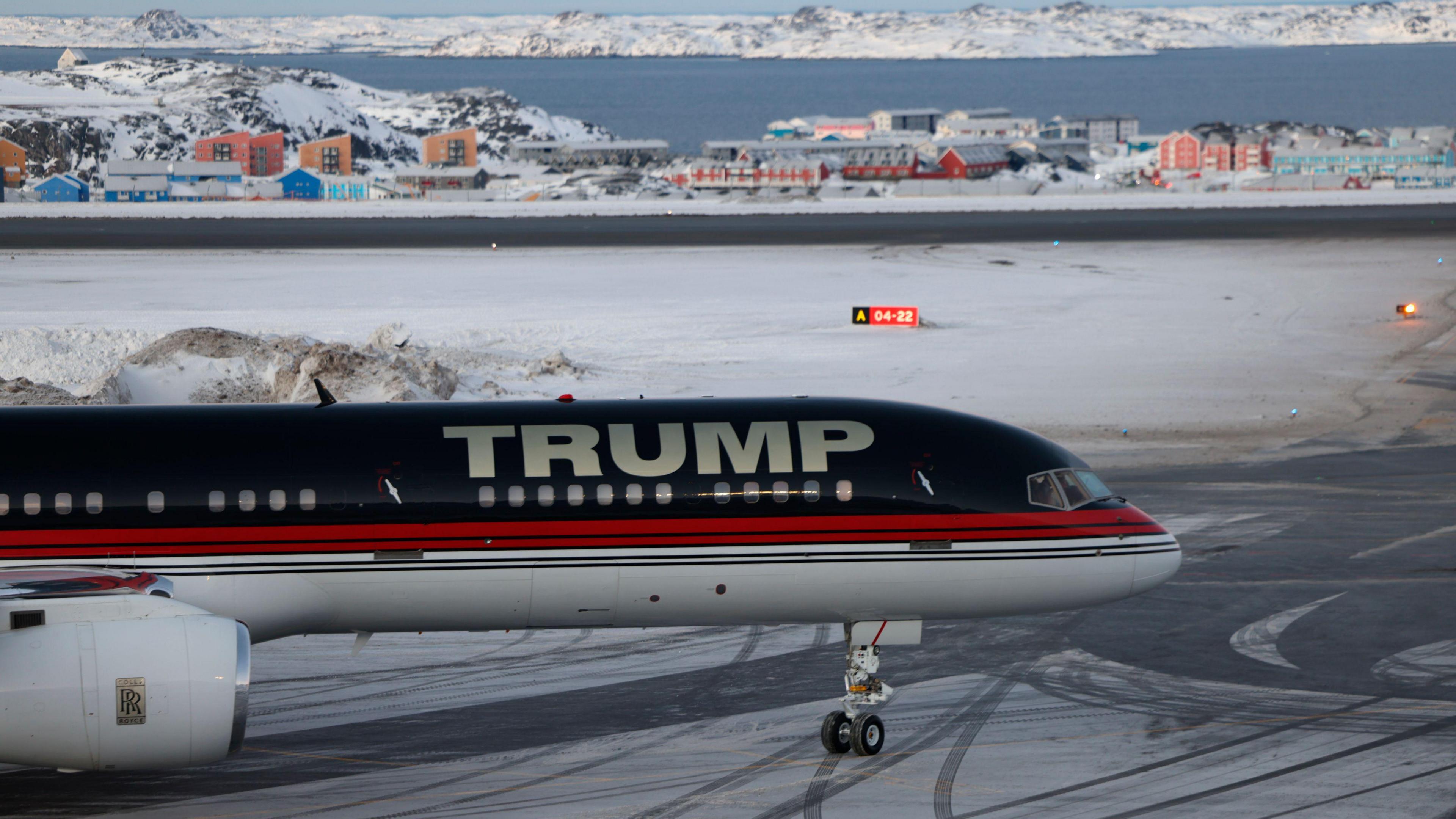 An aircraft with Trump written on it carrying Donald Trump Jr arrives at an airport in Nuuk, Greenland.