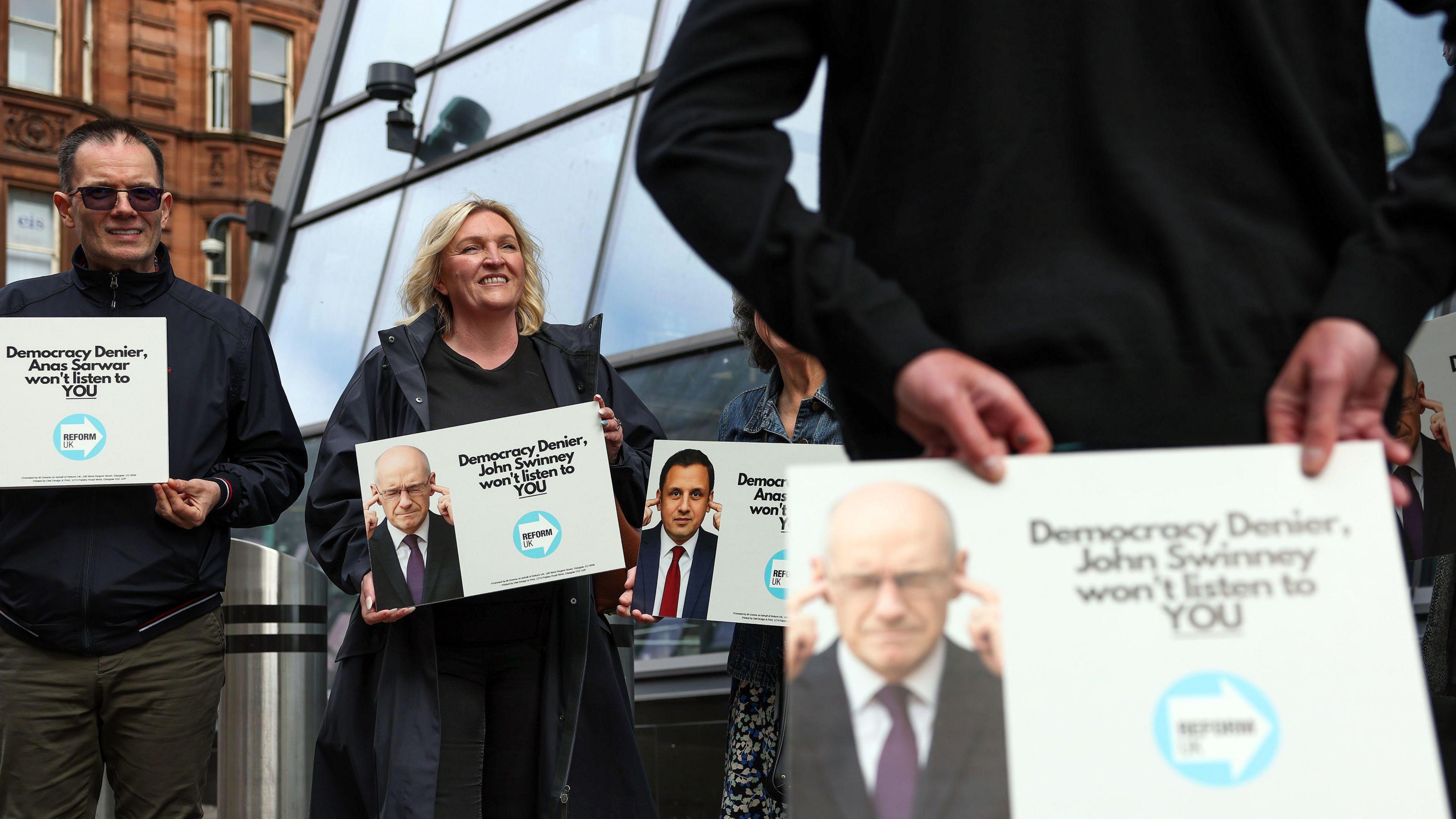 Reform campaigners outside the anti far-right summit in Glasgow.