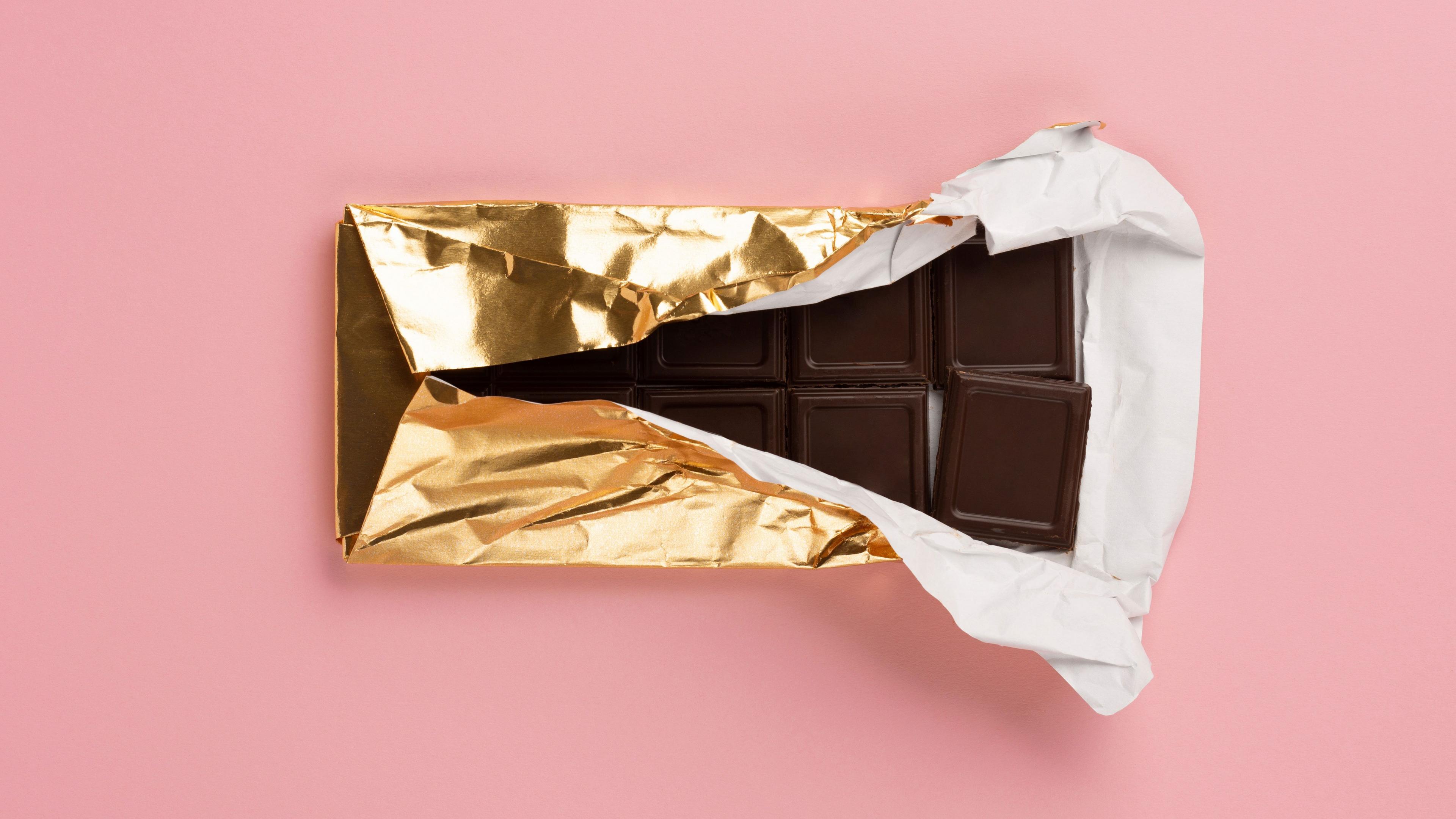 Dark chocolate bar in a gold wrapper 