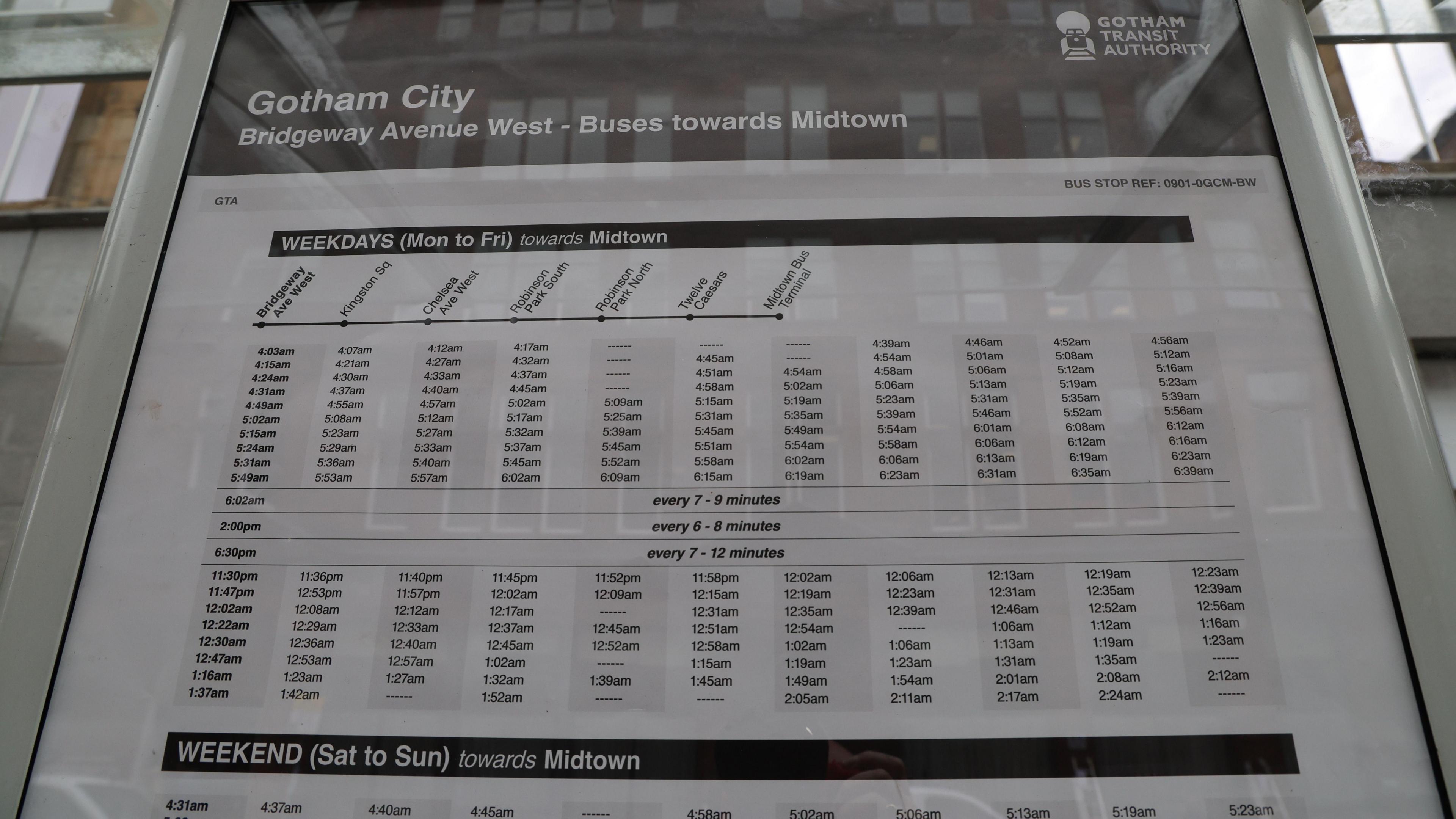 A bus timetable prop for a Batman film, listing buses for Gotham City