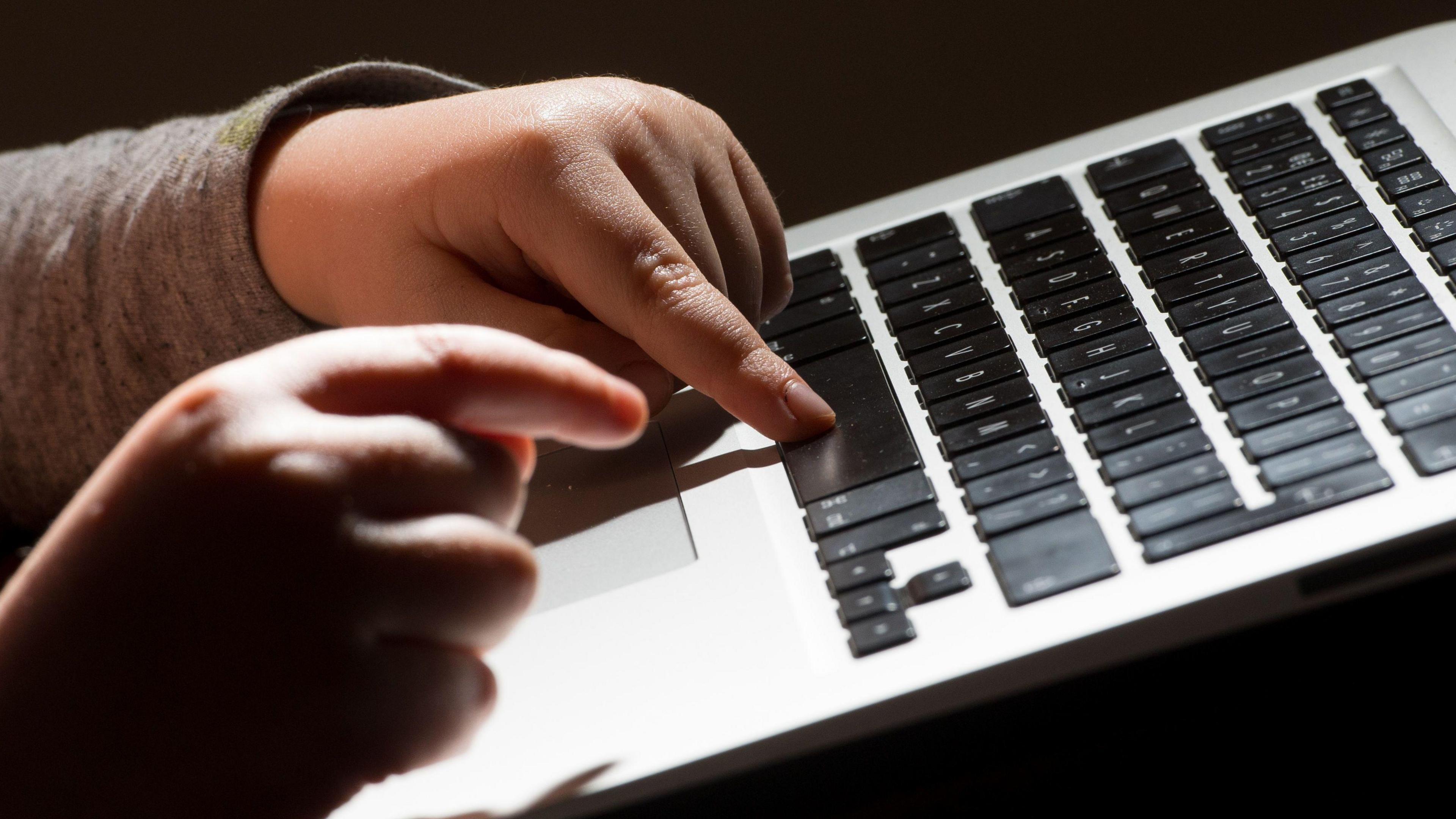 Child using a laptop