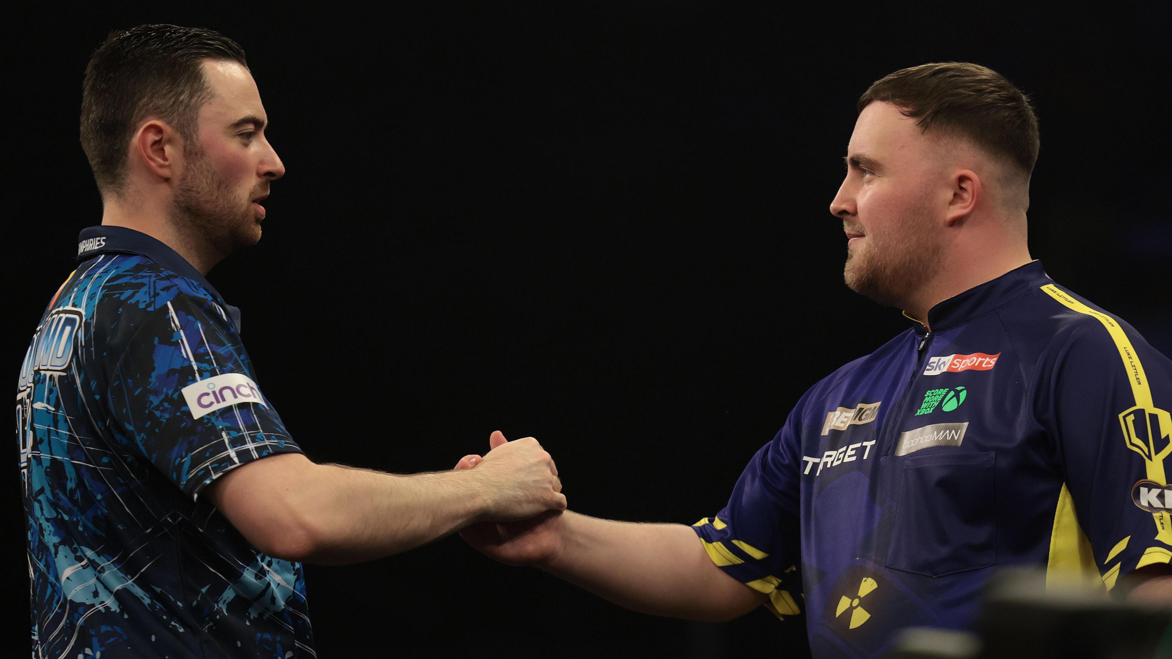 Luke Humphries beat Luke Littler clasp hands