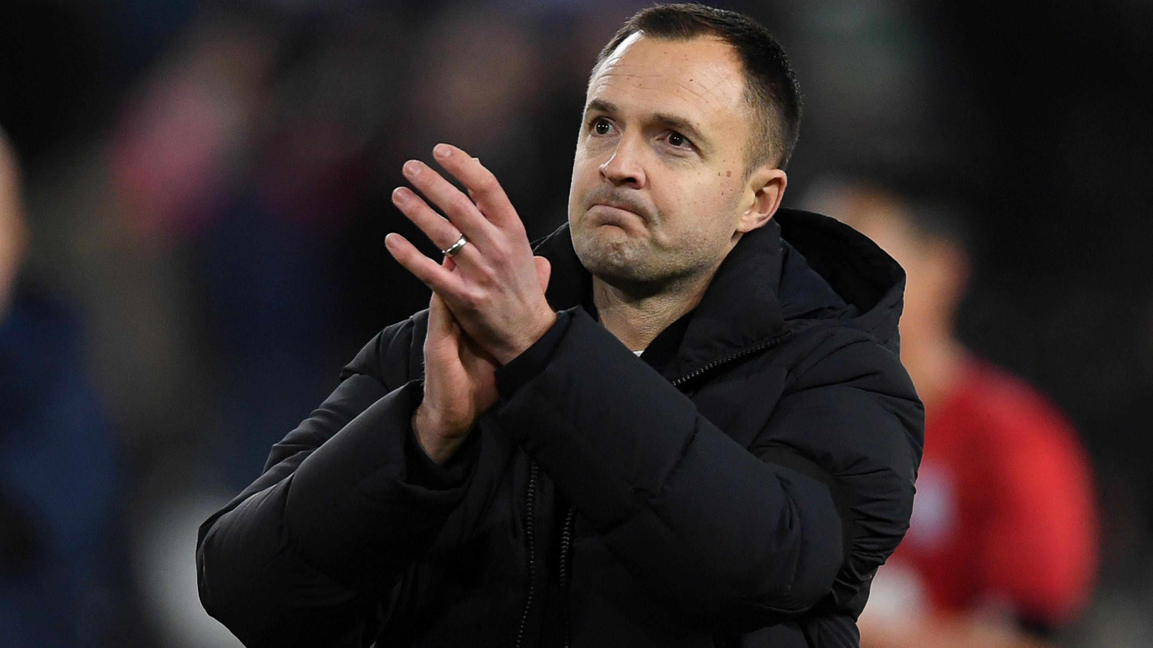 Chris Davies applauds after Swansea's draw with Birmingham 