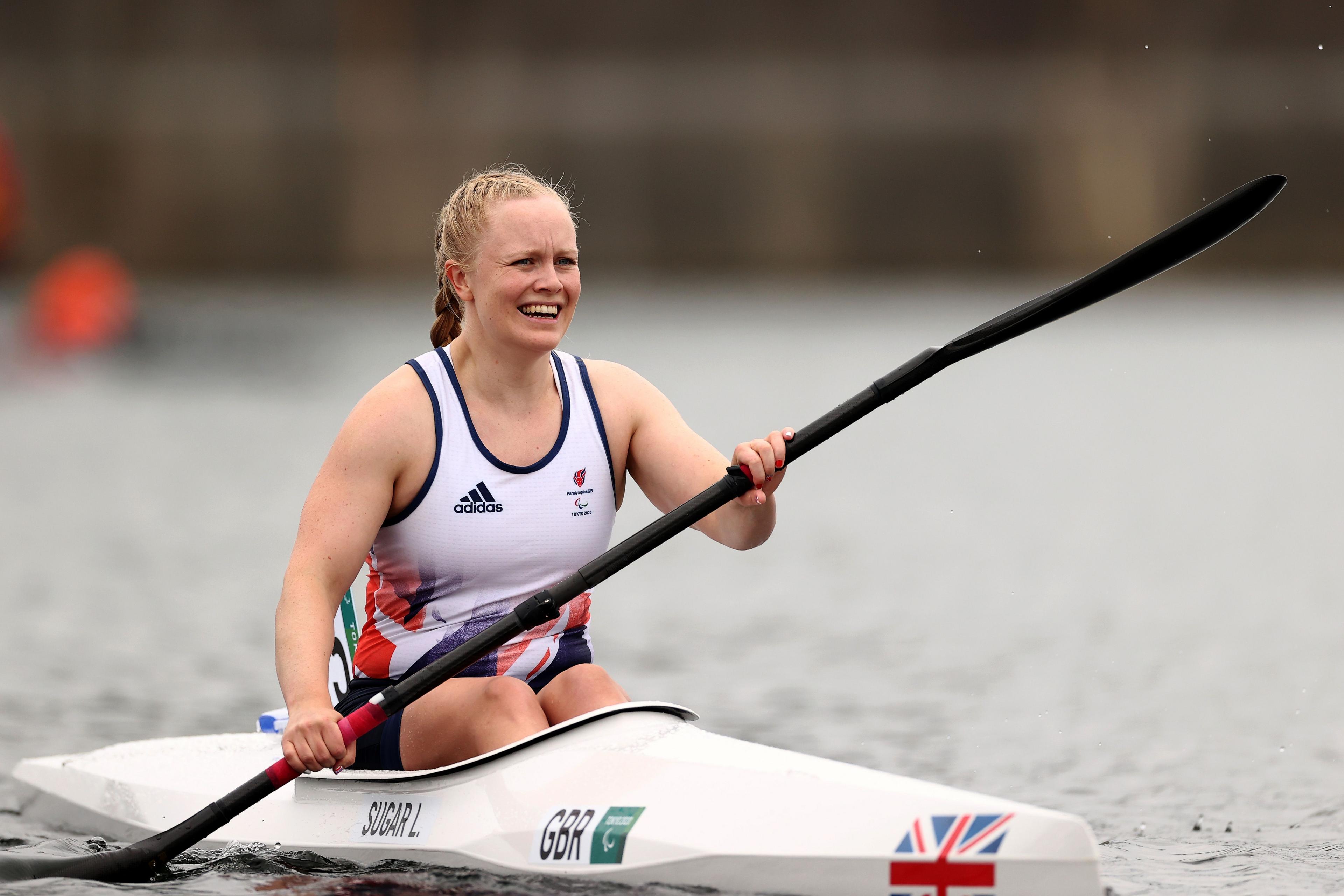 Para-canoeist Laura Sugar celebrates Paralympic gold