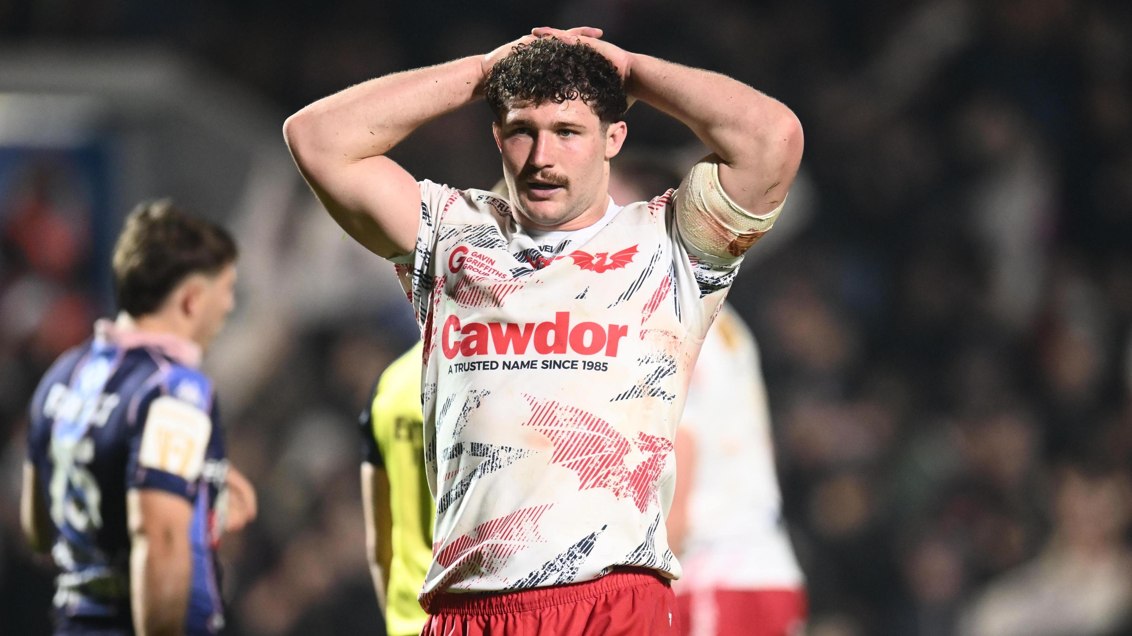 Fletcher Anderson has his hands on his head after Scarlets' defeat at Bordeaux-Begles