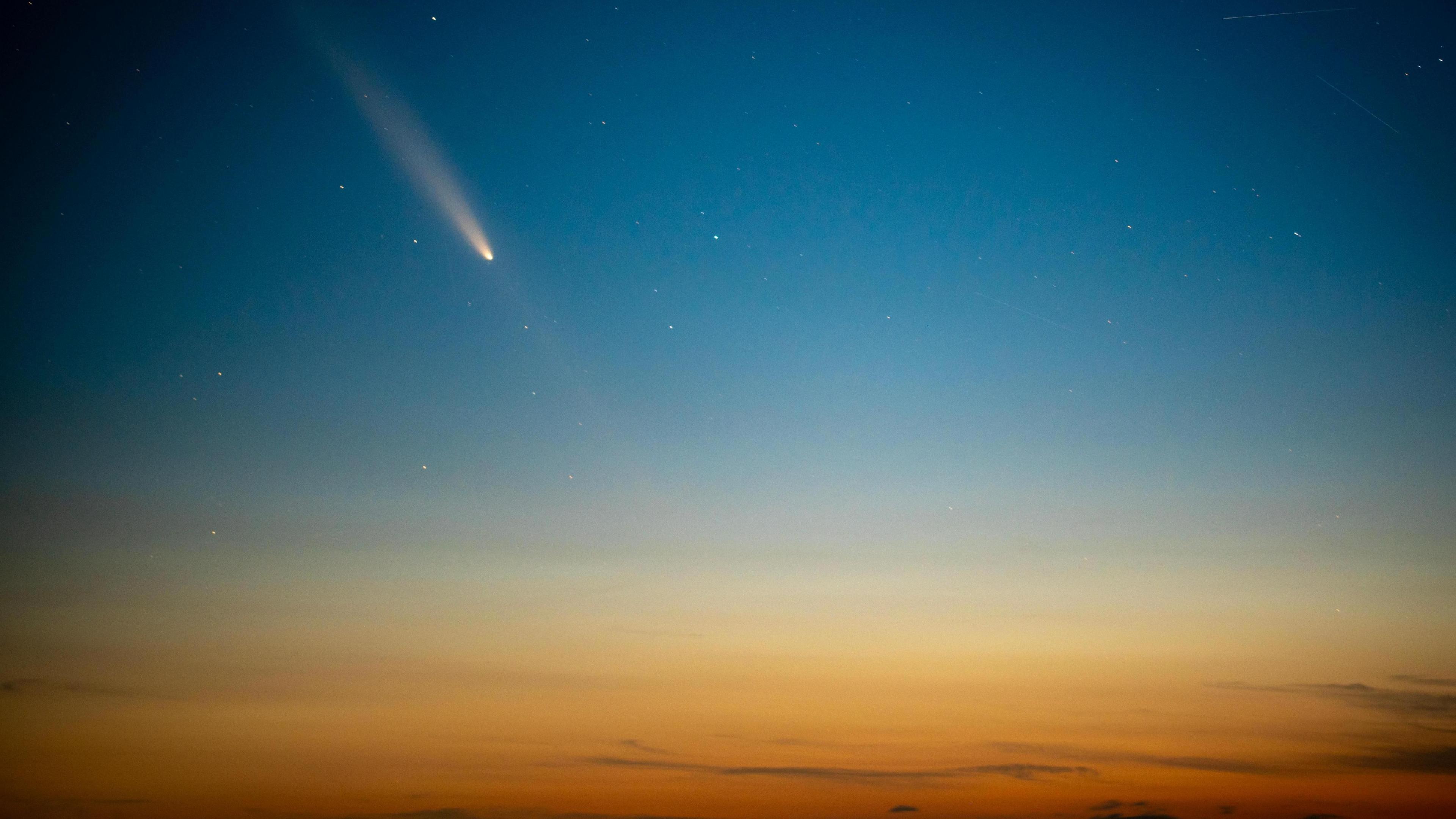 Streak of a comet in the evening sky