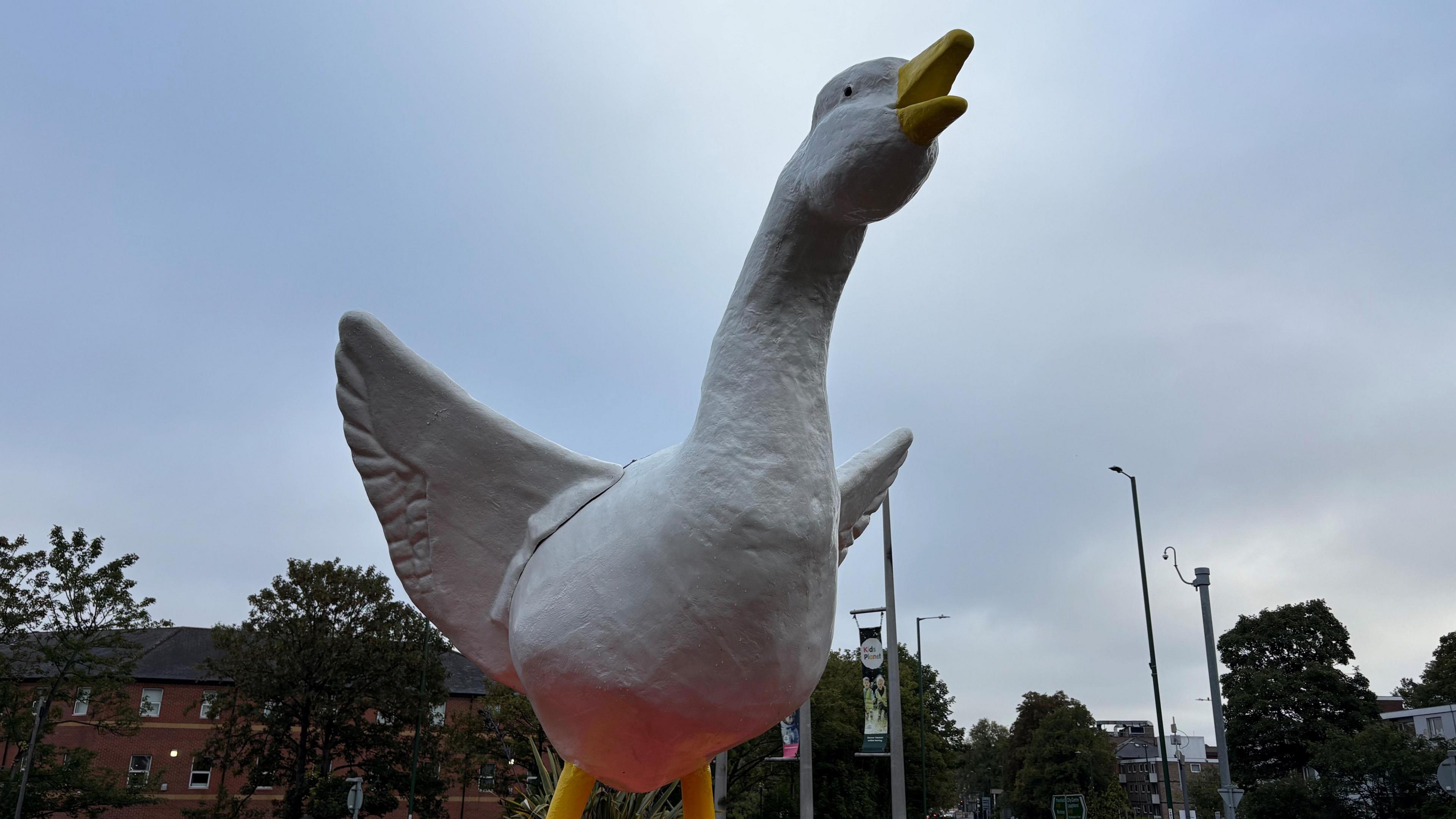 A large goose mascot which sits on a plinth on a roundabout in Nottingham