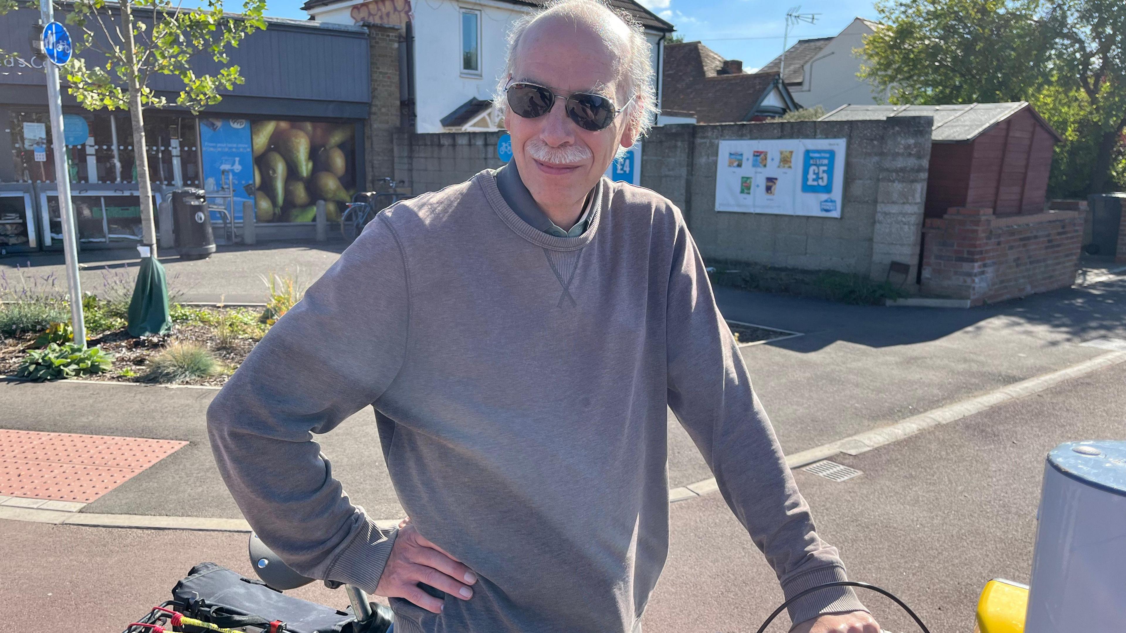 David Andrew on his bicycle at The Cyclops Junction