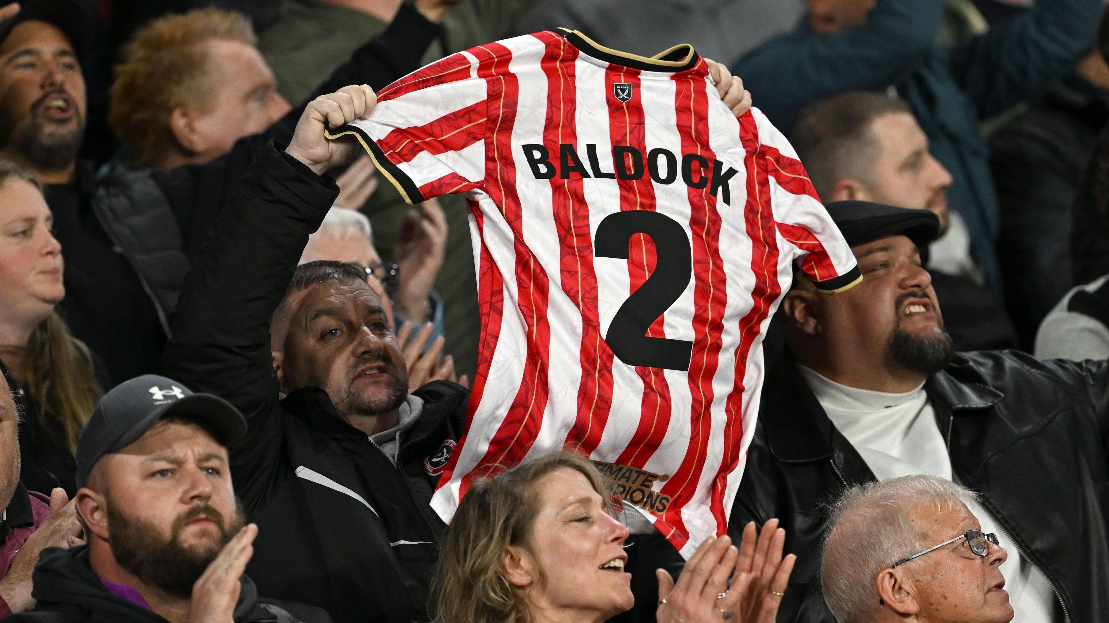 Sheffield United's supporters pay their respects to George Baldock