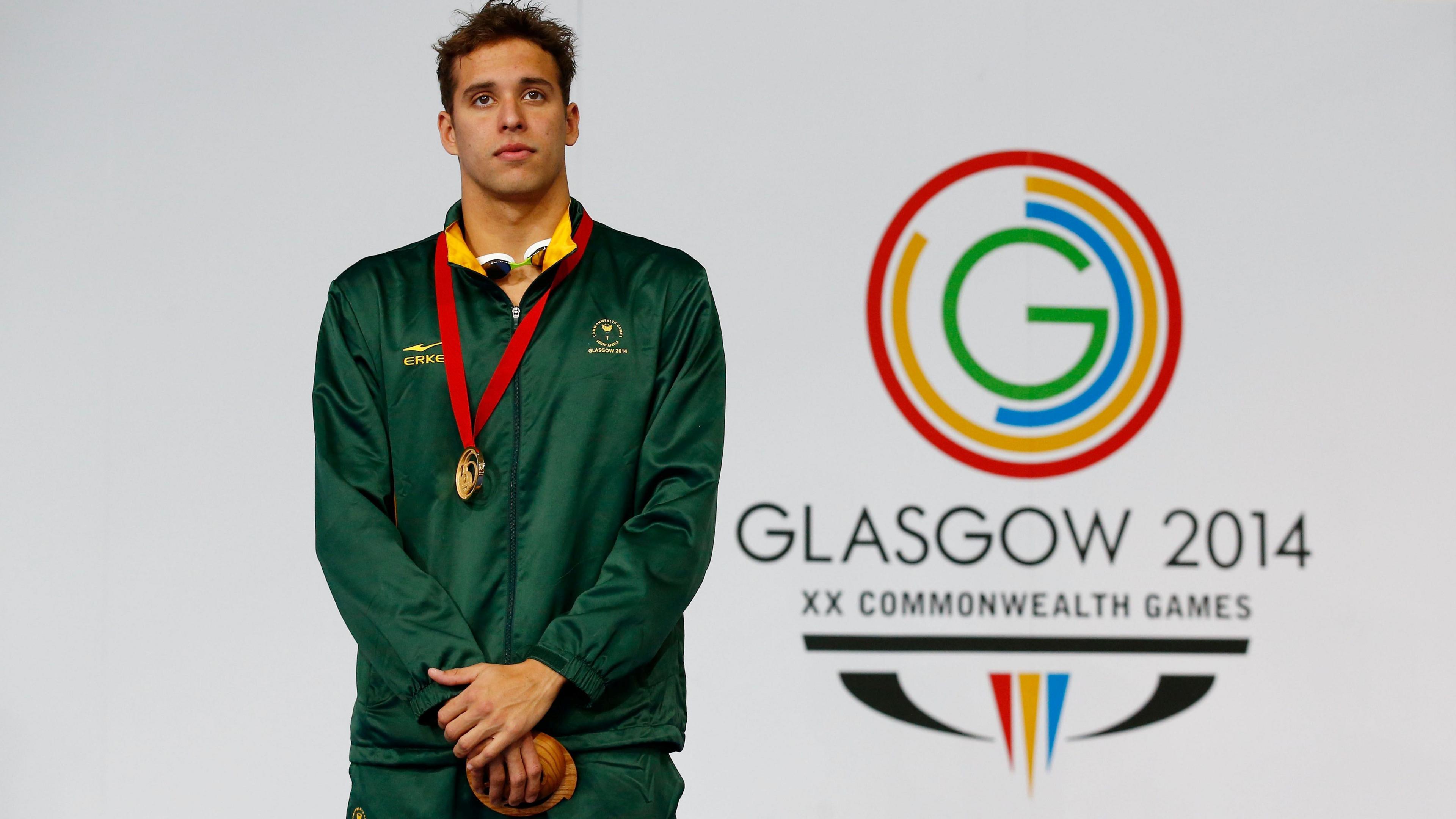 Gold medal winner Chad during the 100m butterly medal ceremony at the Glasgow 2014 Commonwealth Games