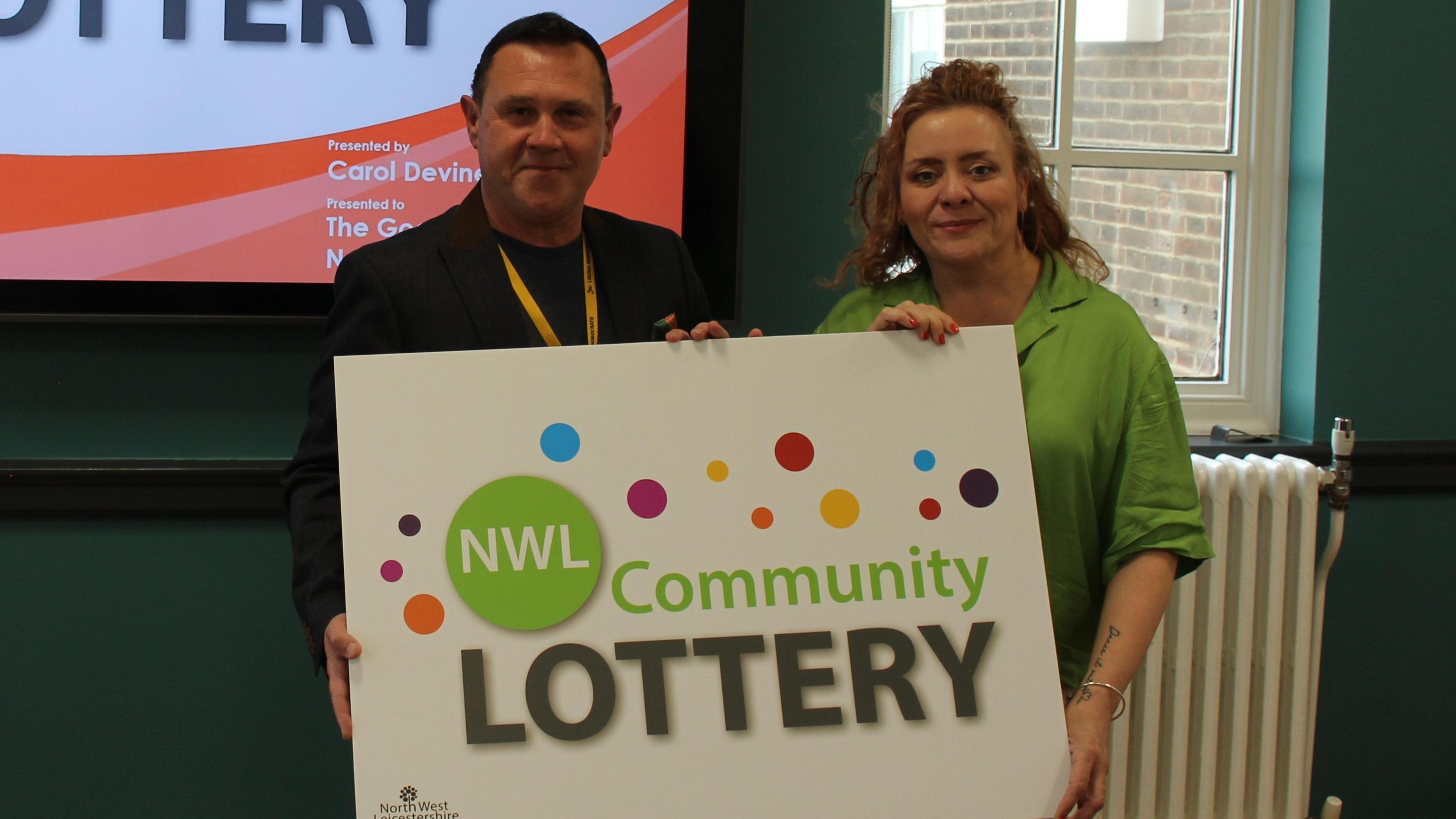 Councillor Michael Wyatt and Carole Devine from Gatherwell Digital Lotteries