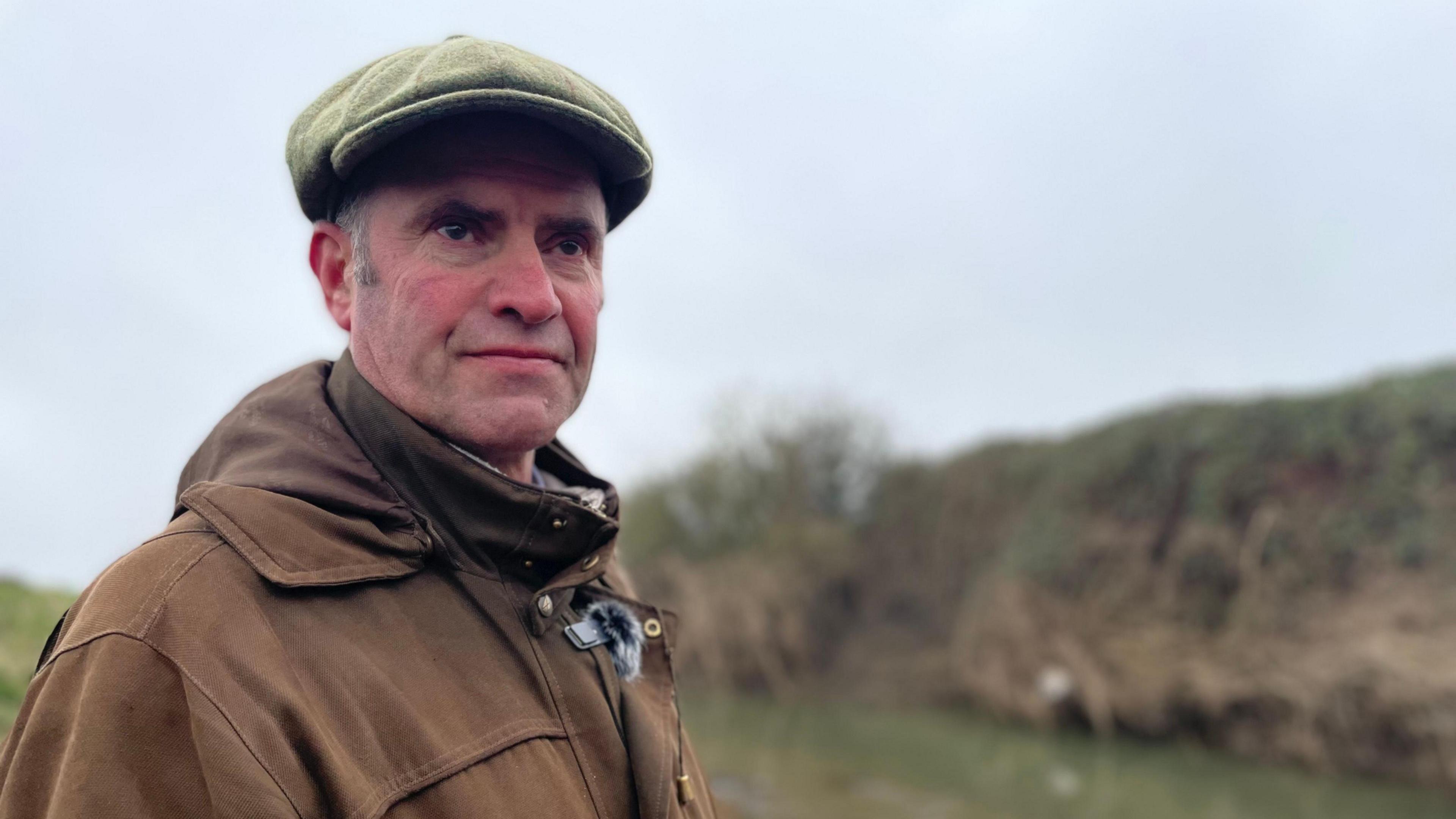 Chairman of the Trent Valley Internal Drainage Board, John Miller by the banks of the River Smite