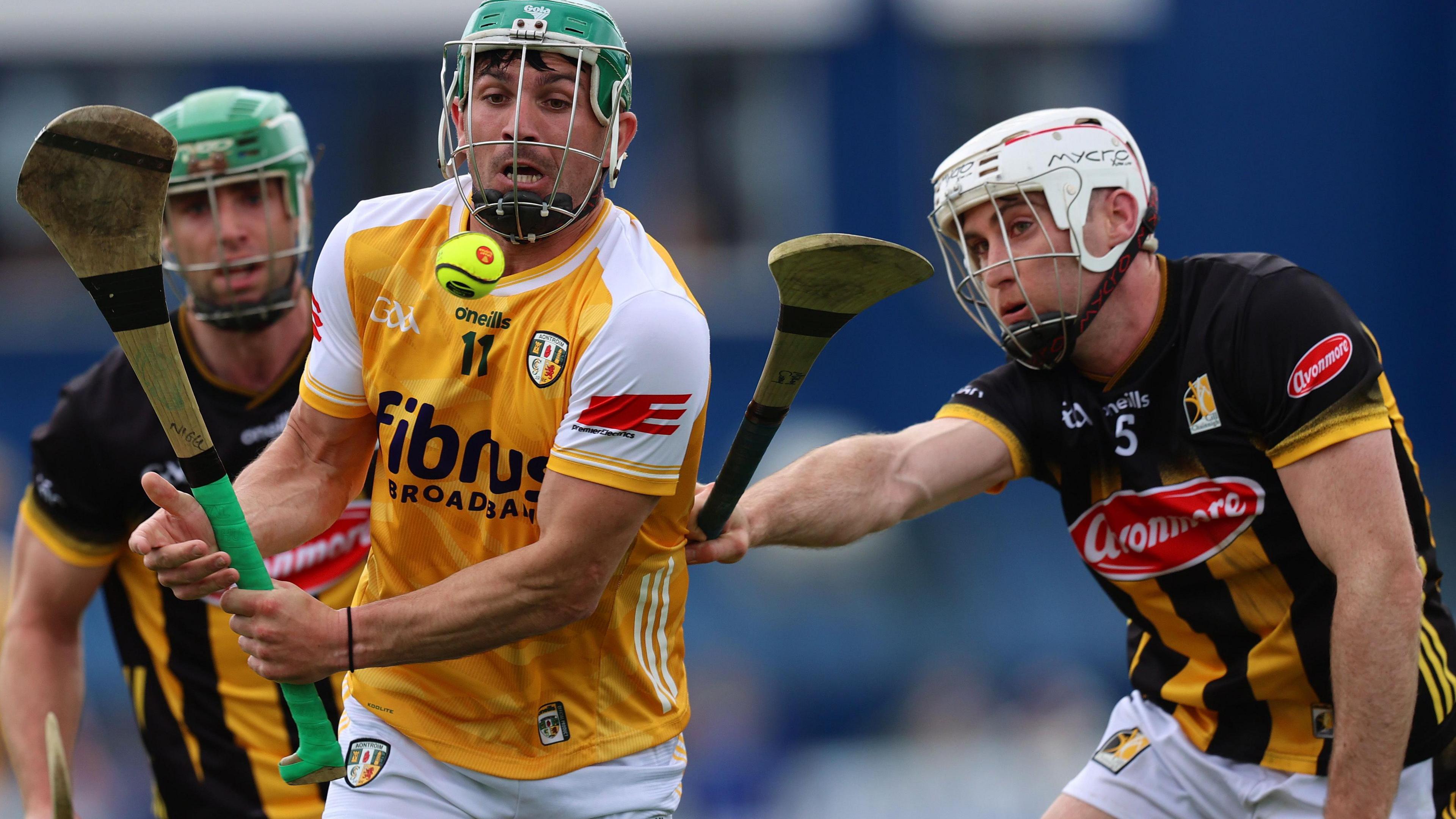 Mikey Carey tackles Nigel Elliot