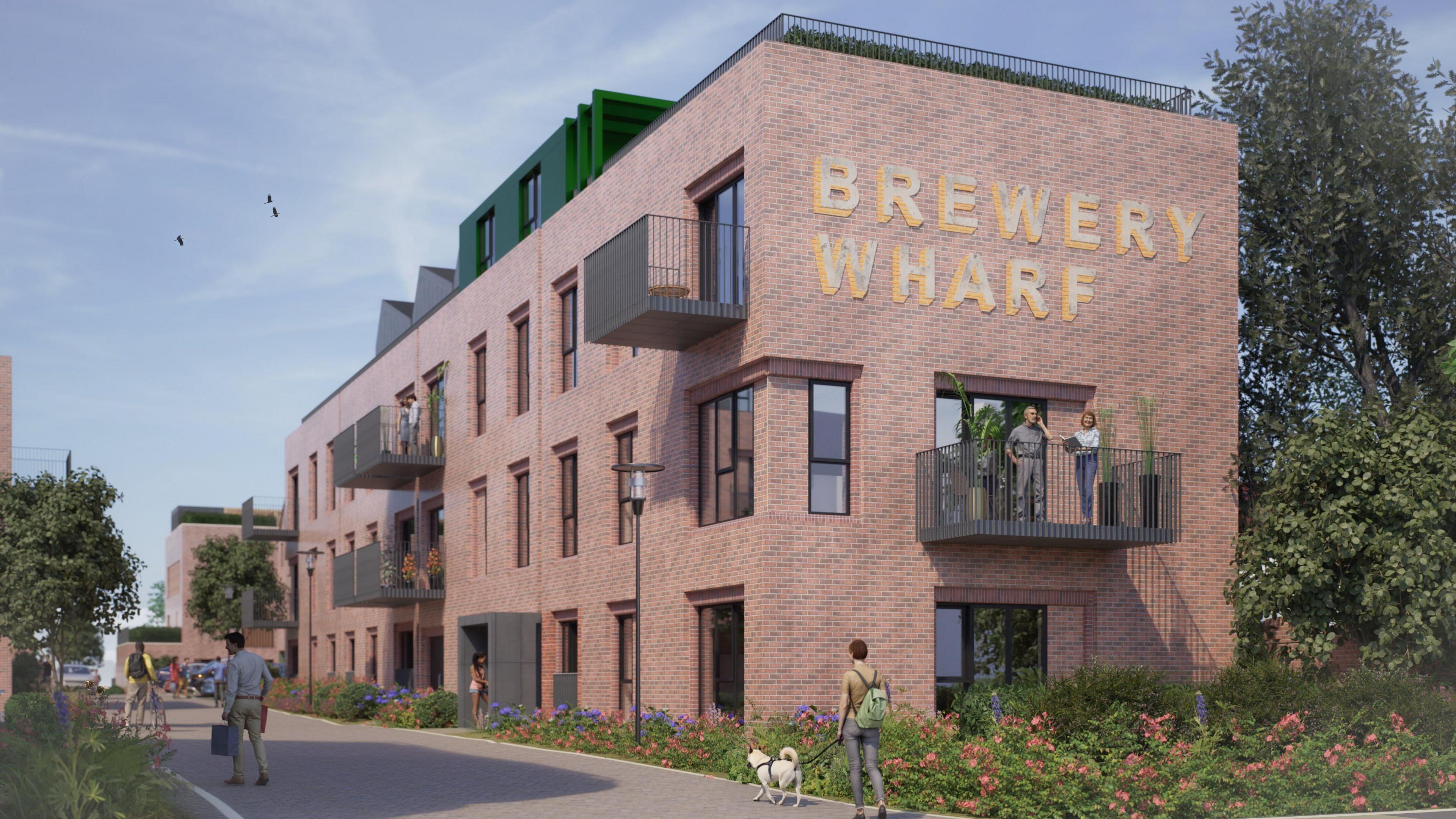 A digital depiction of a four-storey building with people walking around it and greenery. It has a modern look but is red brick and has a large lettering on the building saying Brewery Wharf  