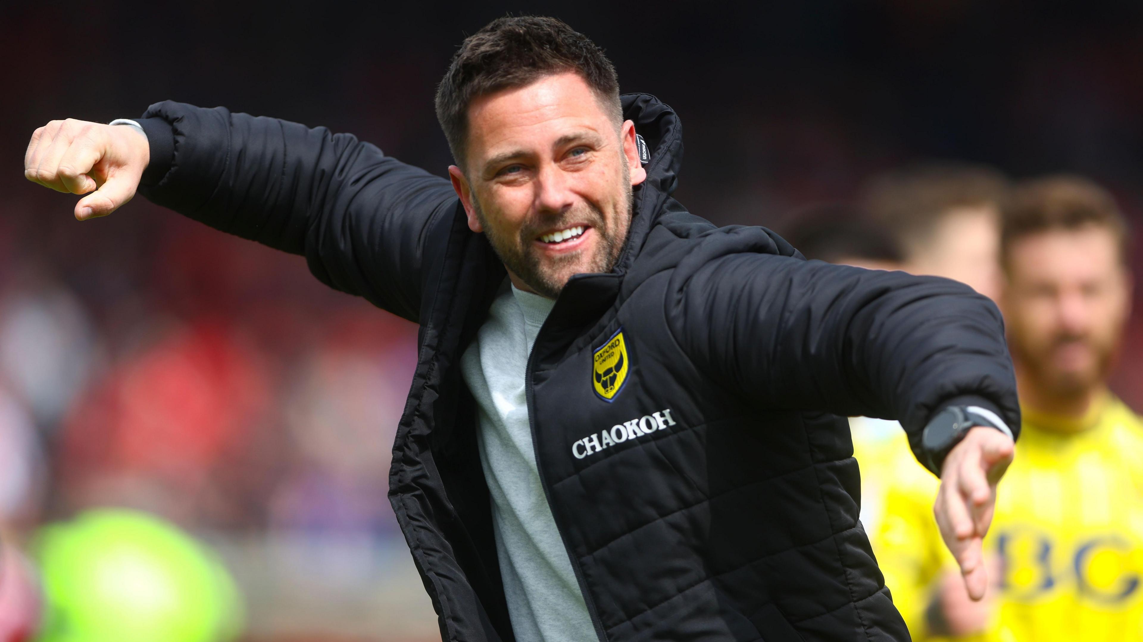 Oxford United manager Des Buckingham celebrates