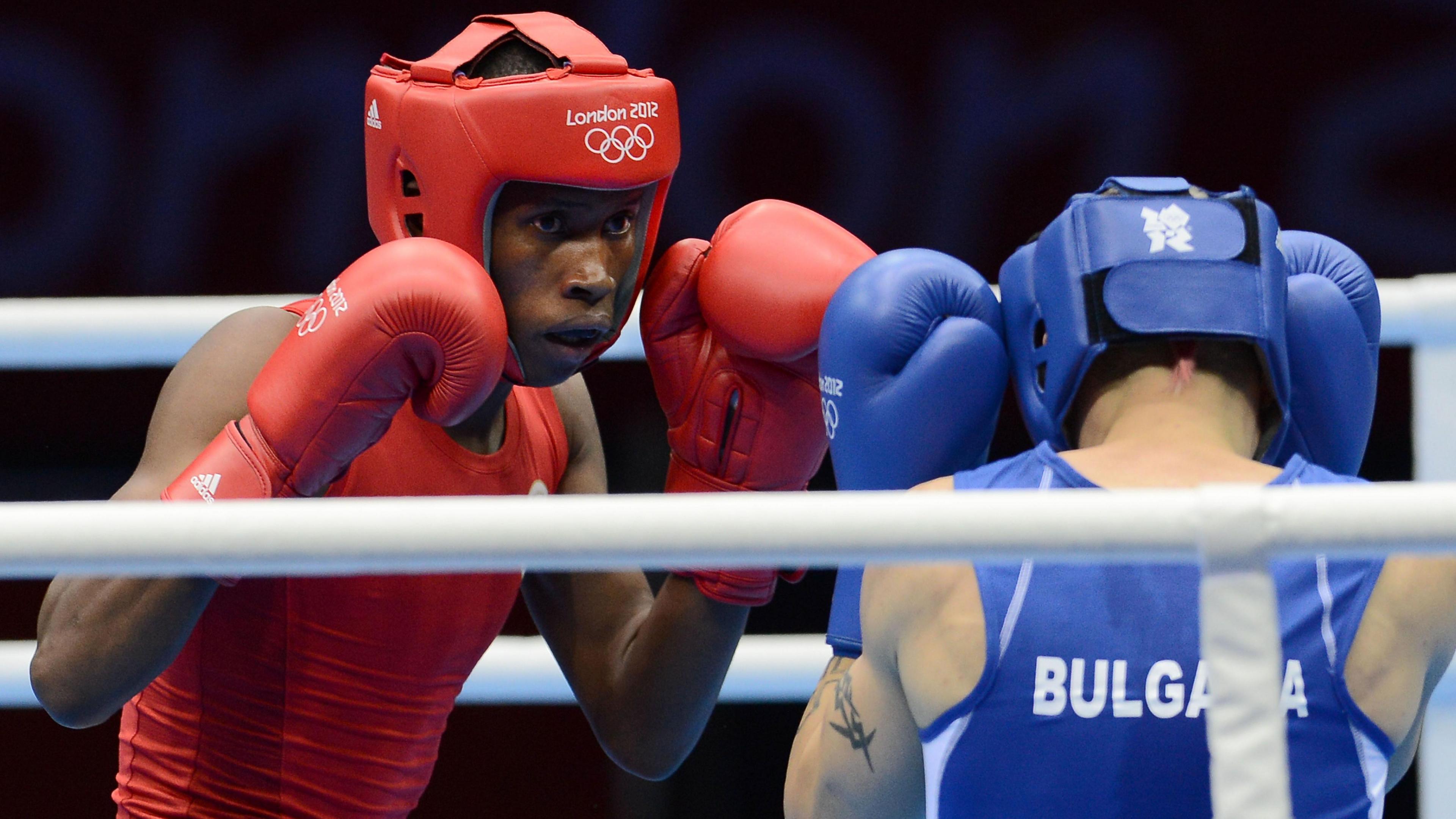 Ayabonga Sonjica puts a guard up during an Olympic boxing bout