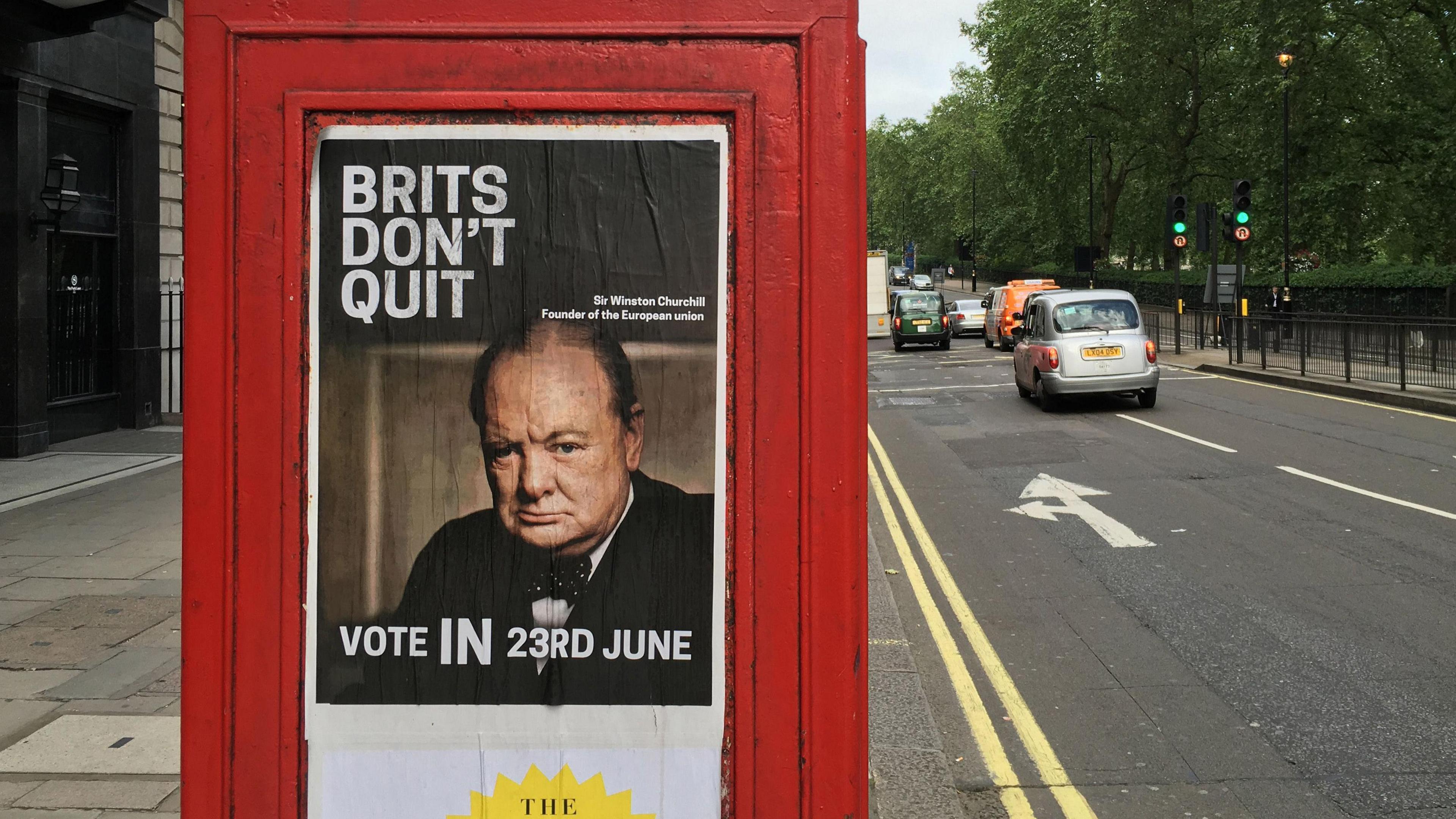 Taken during the EU Referendum, a Remain poster is pictured on the side of a red telephone box at Piccadilly showing an image of Winston Churchill.