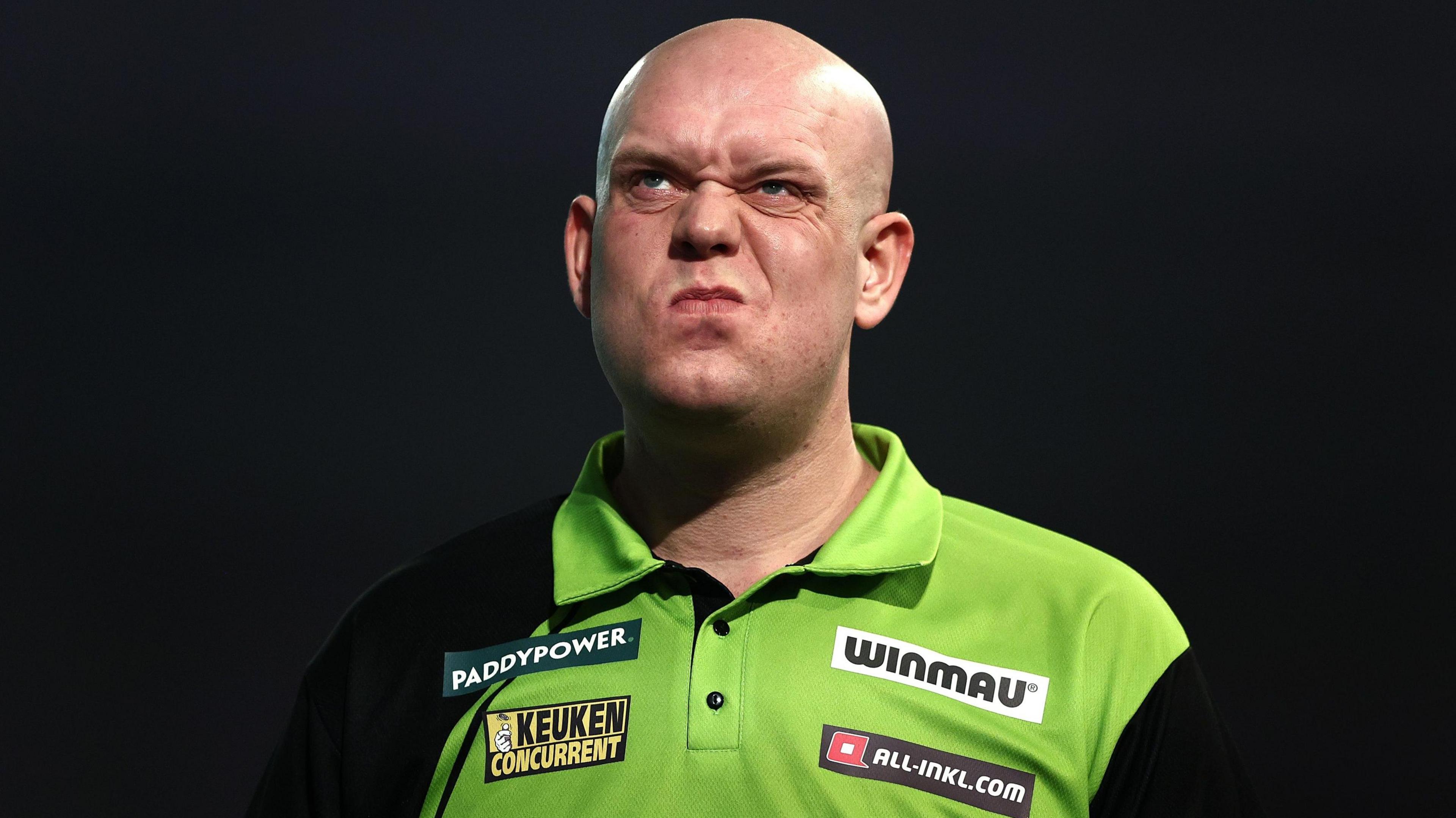 Michael van Gerwen looks on during the 2025 World Darts Championship final