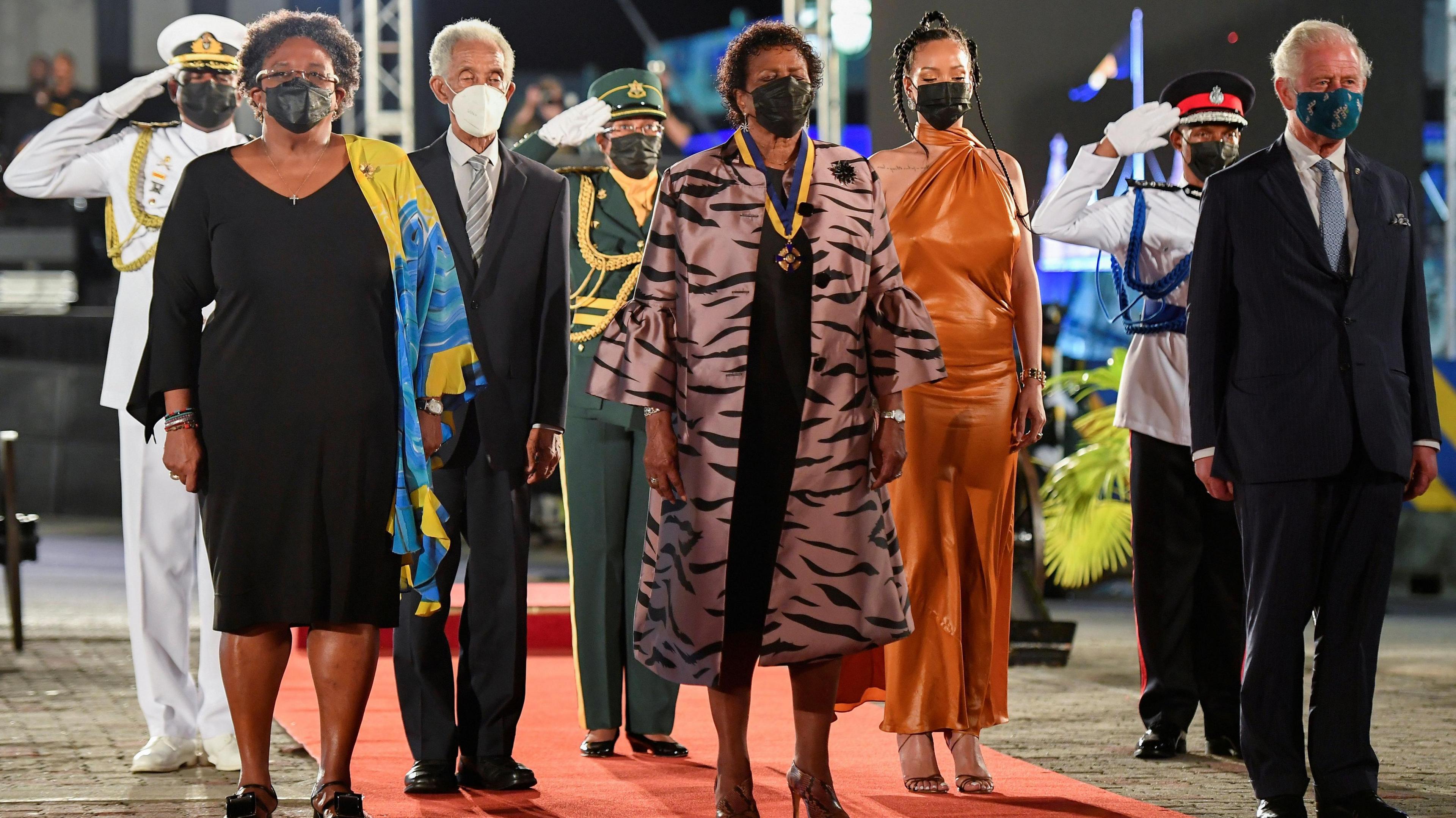 Sir Garfield Sobers (third left, white mask) attends the presidential inauguration ceremony as Barbados formally becomes a republic, flanked by prime minister Mia Mottley, president Dame Sandra Mason, singer Rihanna and Prince Charles