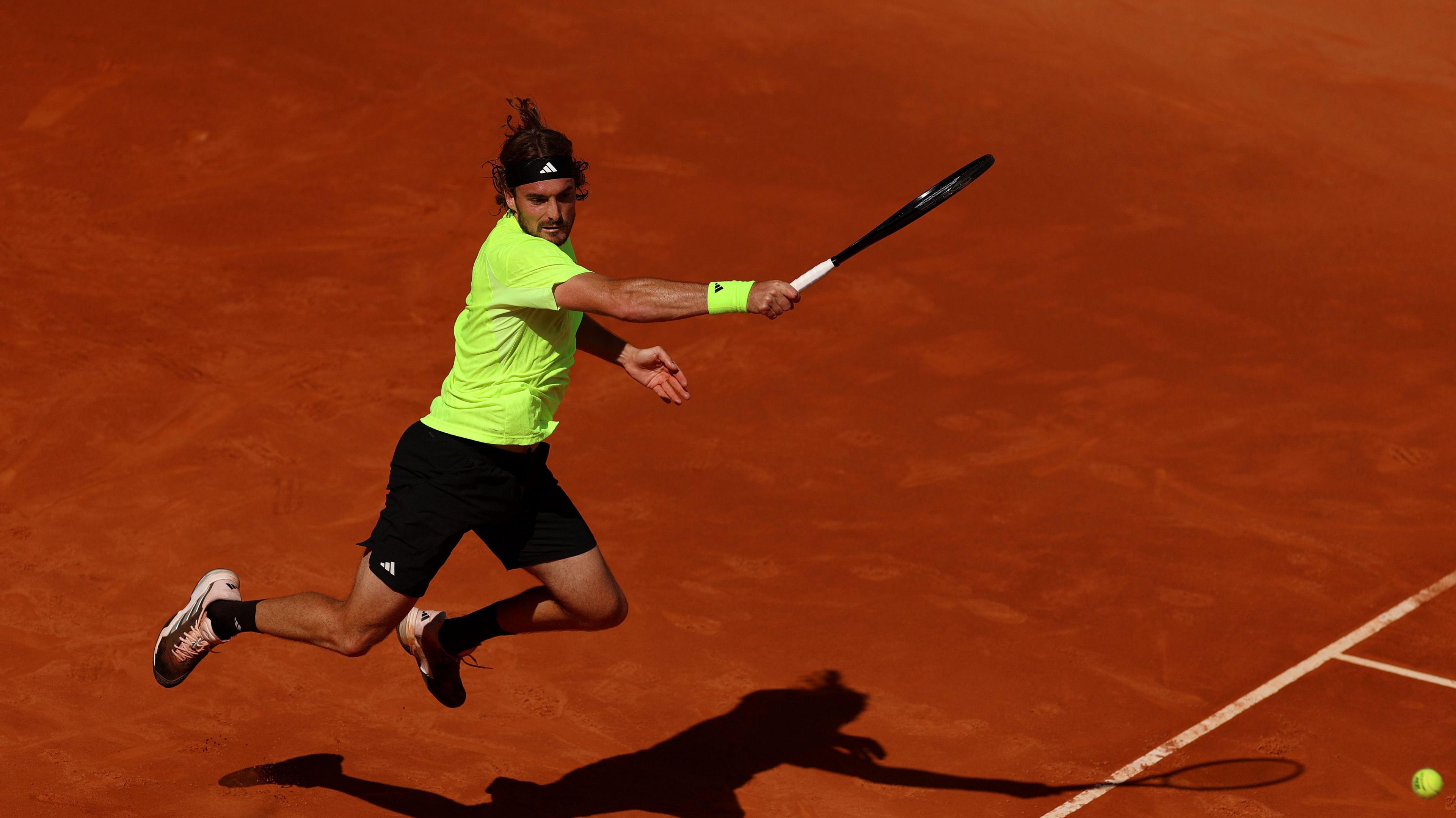 Greece's Stefanos Tsitsipas in action during his match against Italy's Lorenzo Musetti during day eight of the Mutua Madrid Open at La Caja Magica in Madrid, Spain