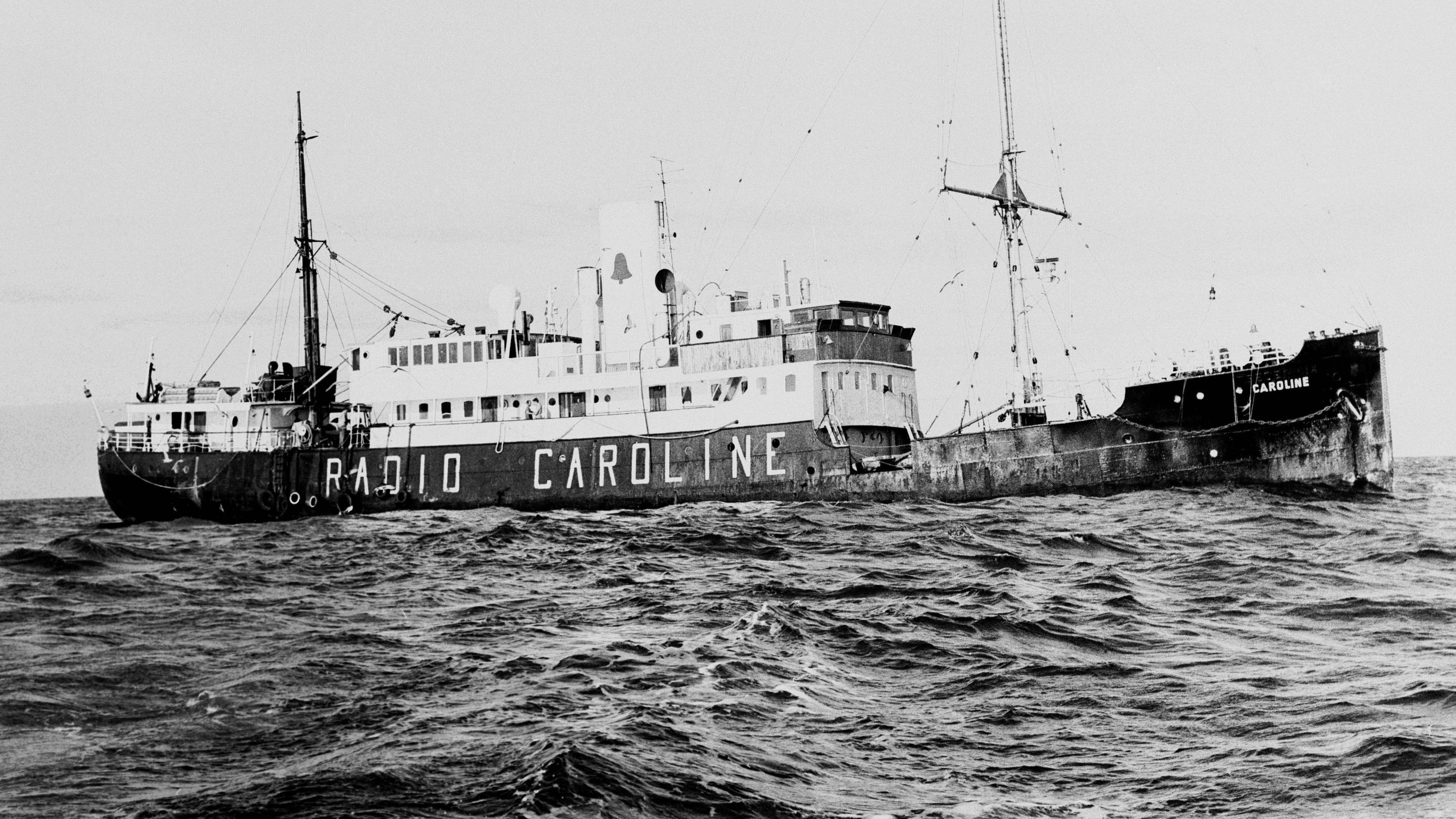 Black and white photo of the Radio Caroline ship at sea