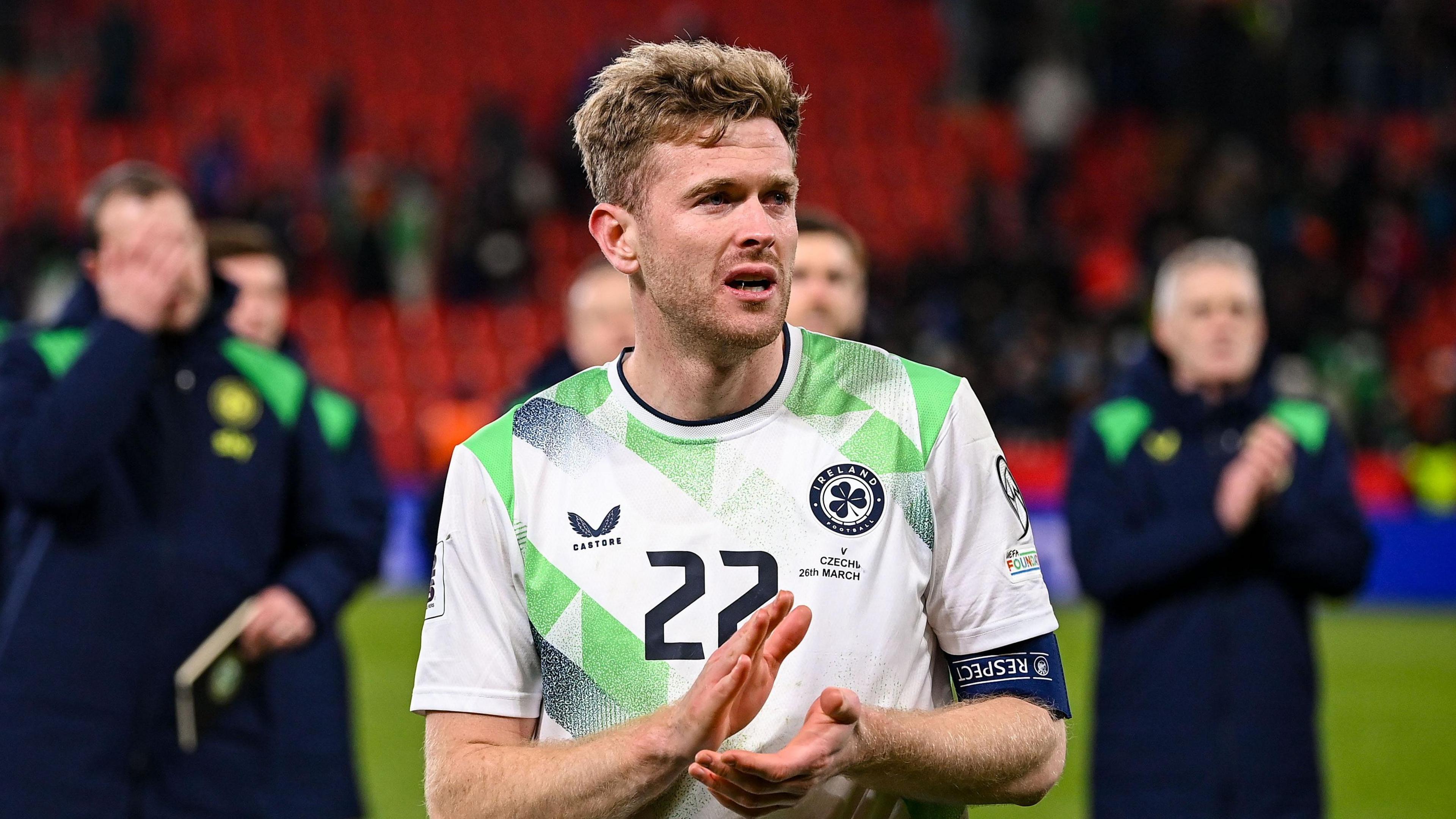 Nathan Collins applauds the Republic of Ireland fans in Prague