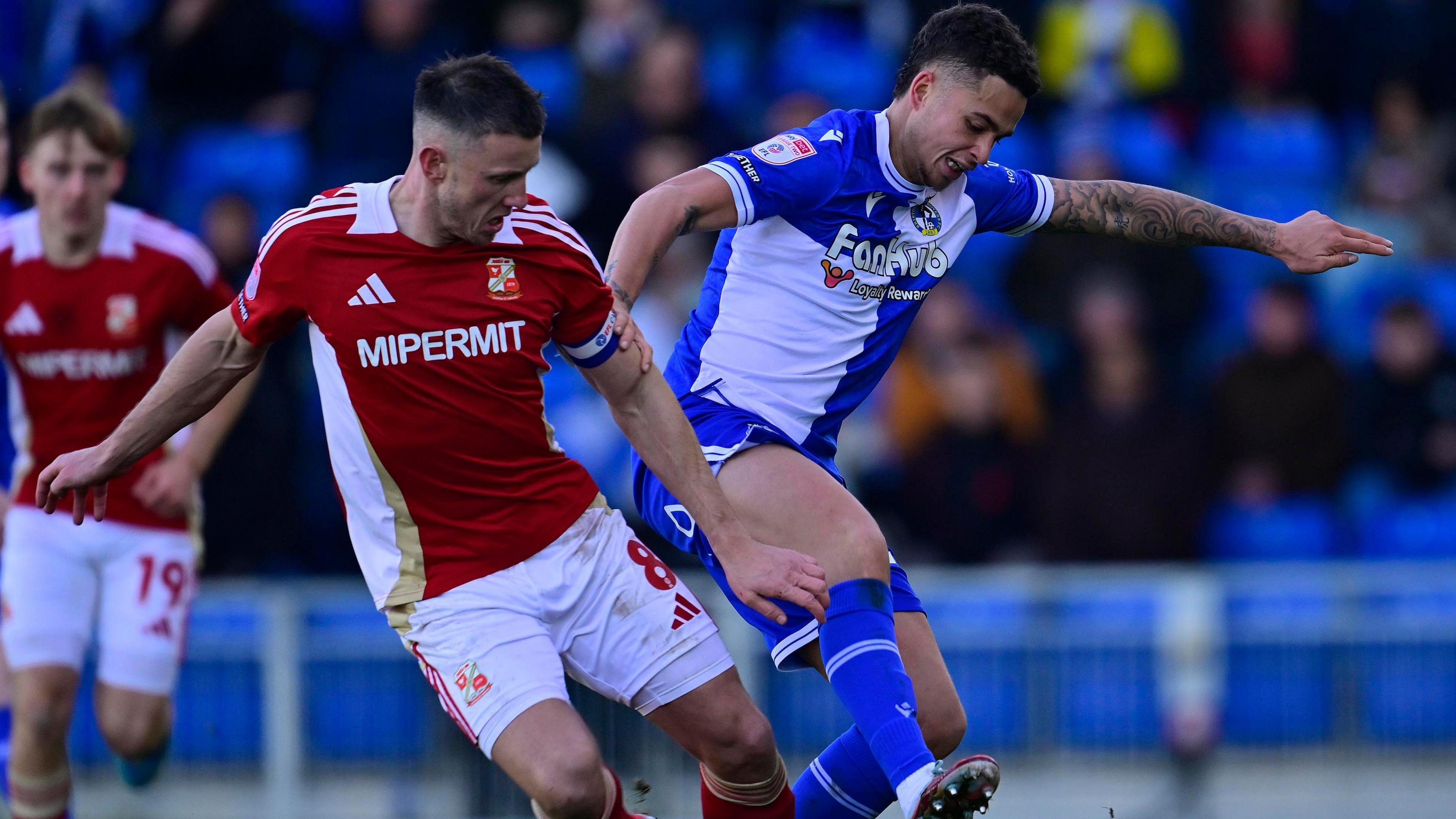 Ollie Clarke: Swindon Town captain returns to action after seven-game ban - BBC Sport