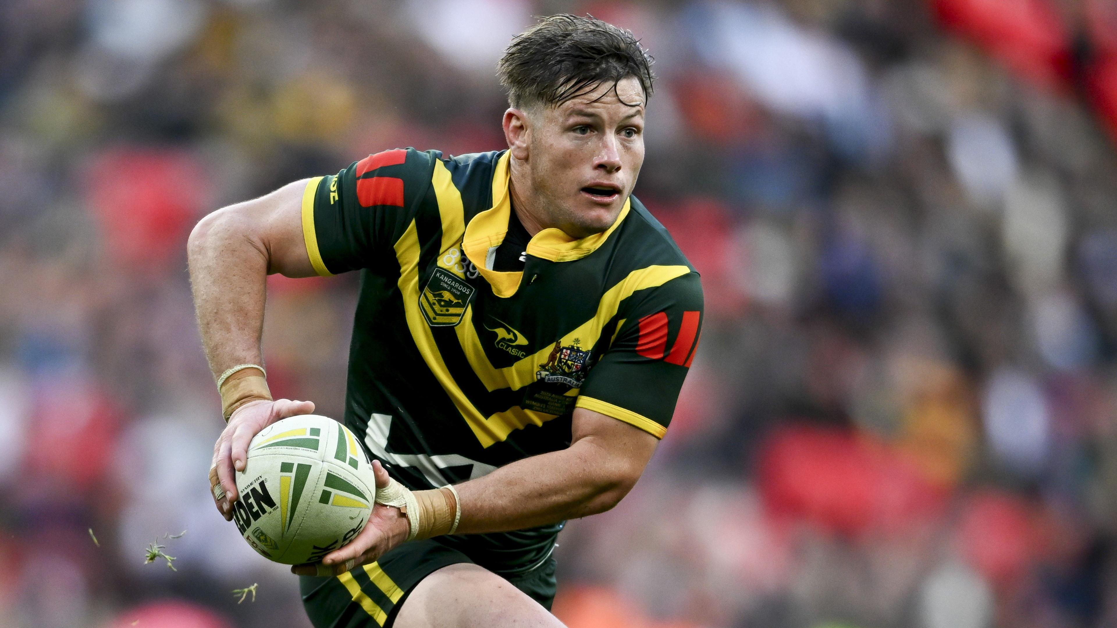 Harry Grant carries the ball