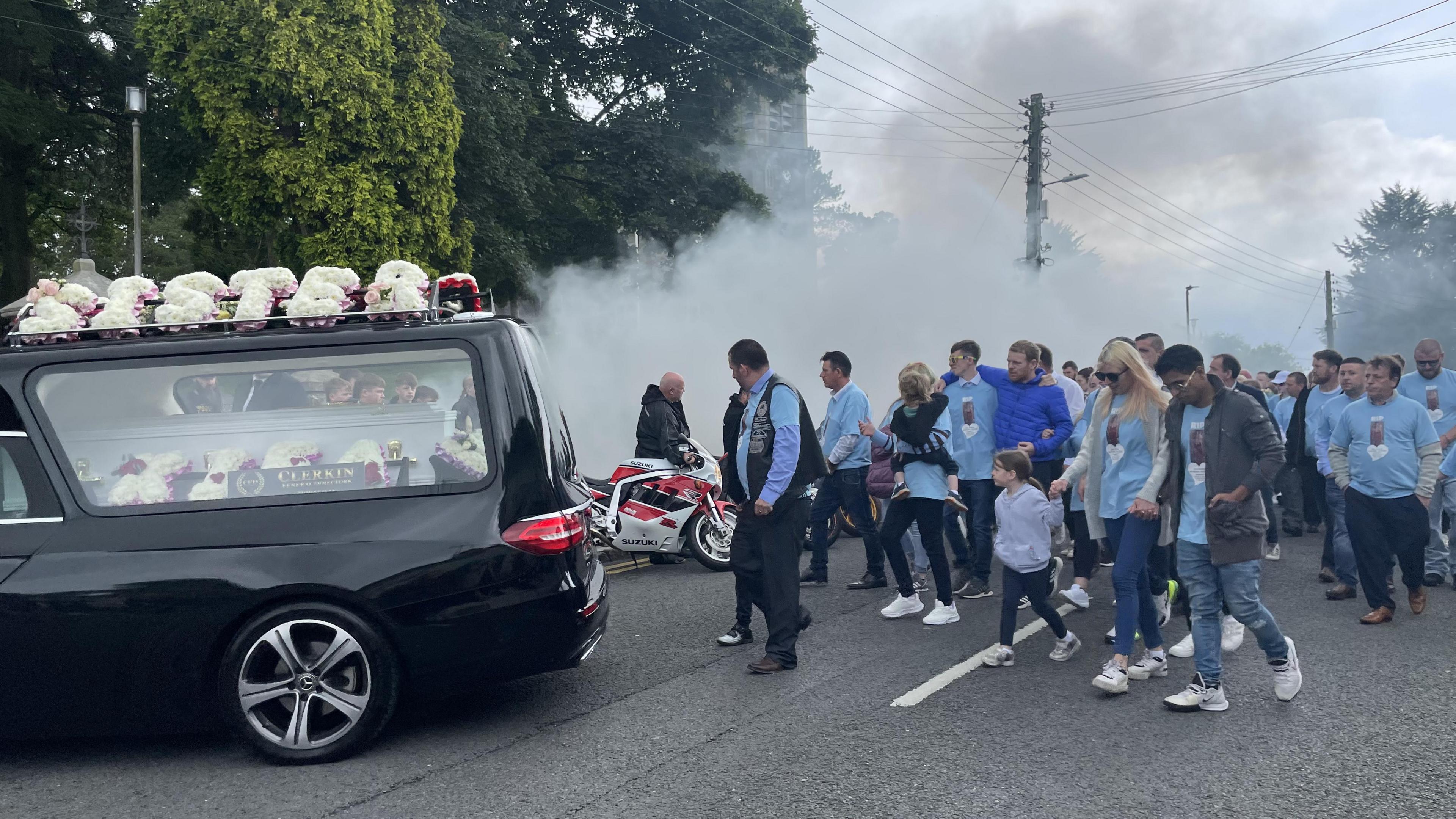 Biker tribute outside the church in Clones as Kiea McCann's white coffin arrives for her funeral Mass