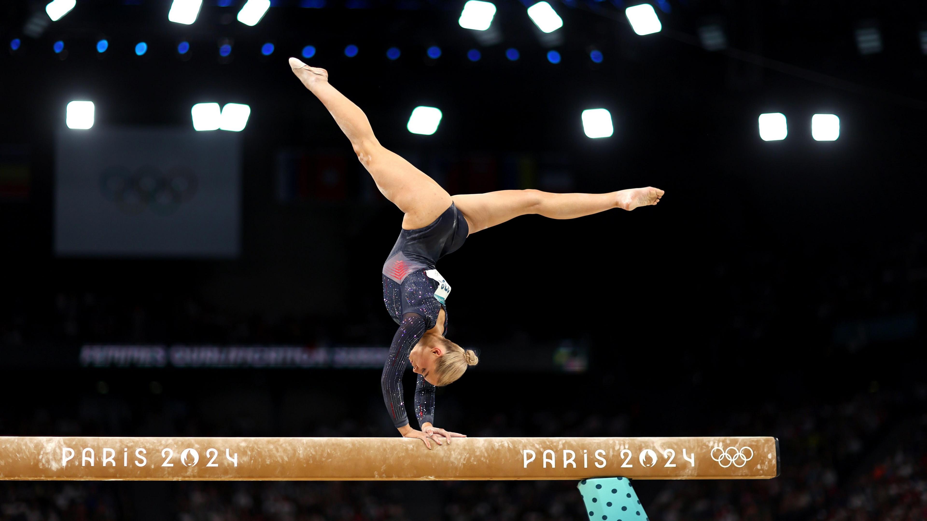 Ruby Evans of Team GB competes on the balance beam during the artistic gymnastics women's qualification on day two of the Olympic Games Paris 2024