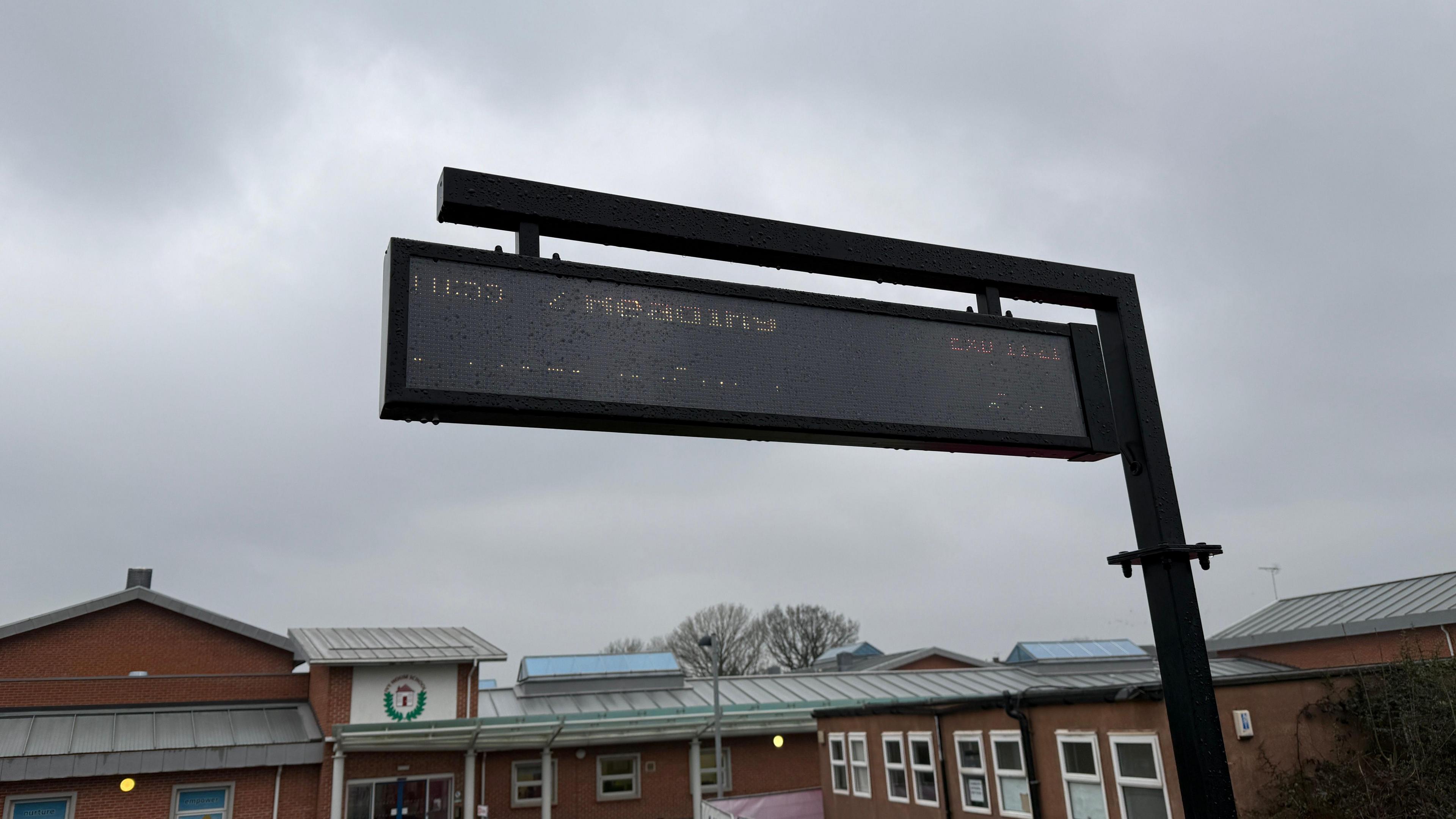 A train departures board which says "Reading exp 11:21"