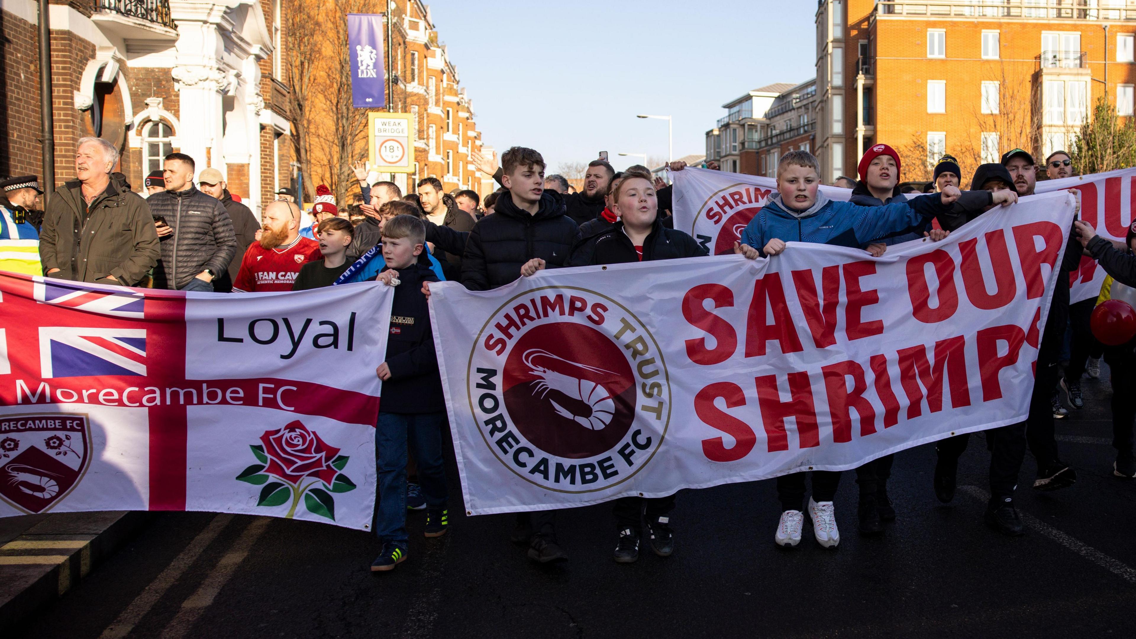 Morecambe fans protest against the club's owners