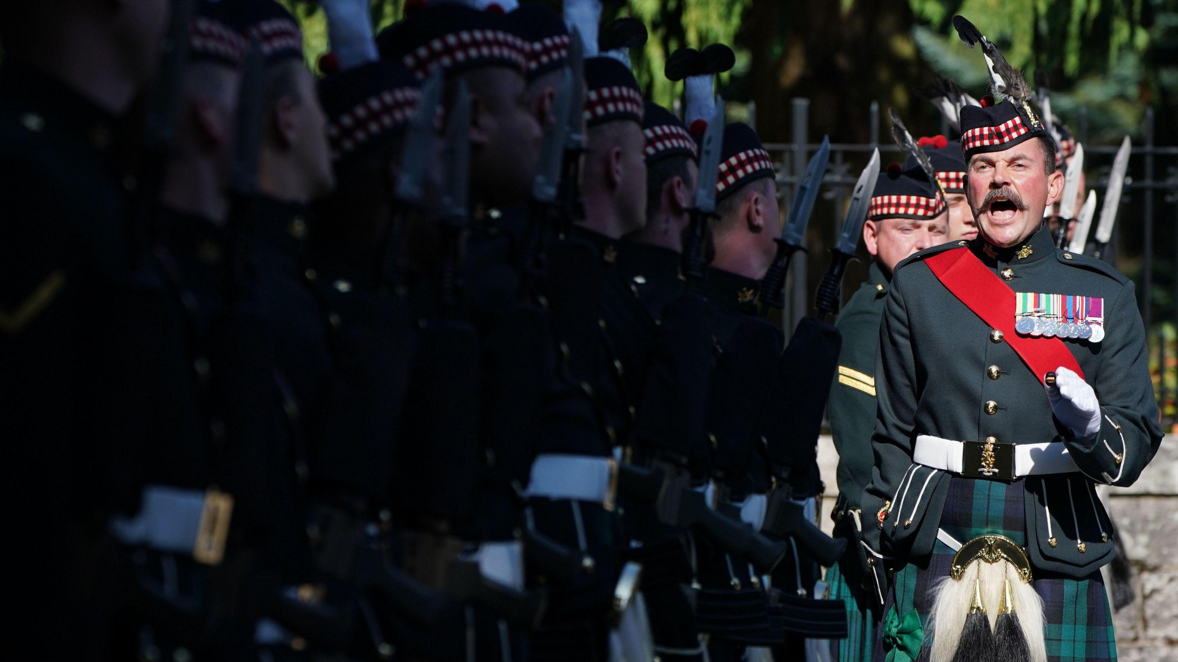 Members of Balaklava Company, 5th Battalion, The Royal Regiment of Scotland, at the gates of Balmoral, before King Charles III carries out an inspection