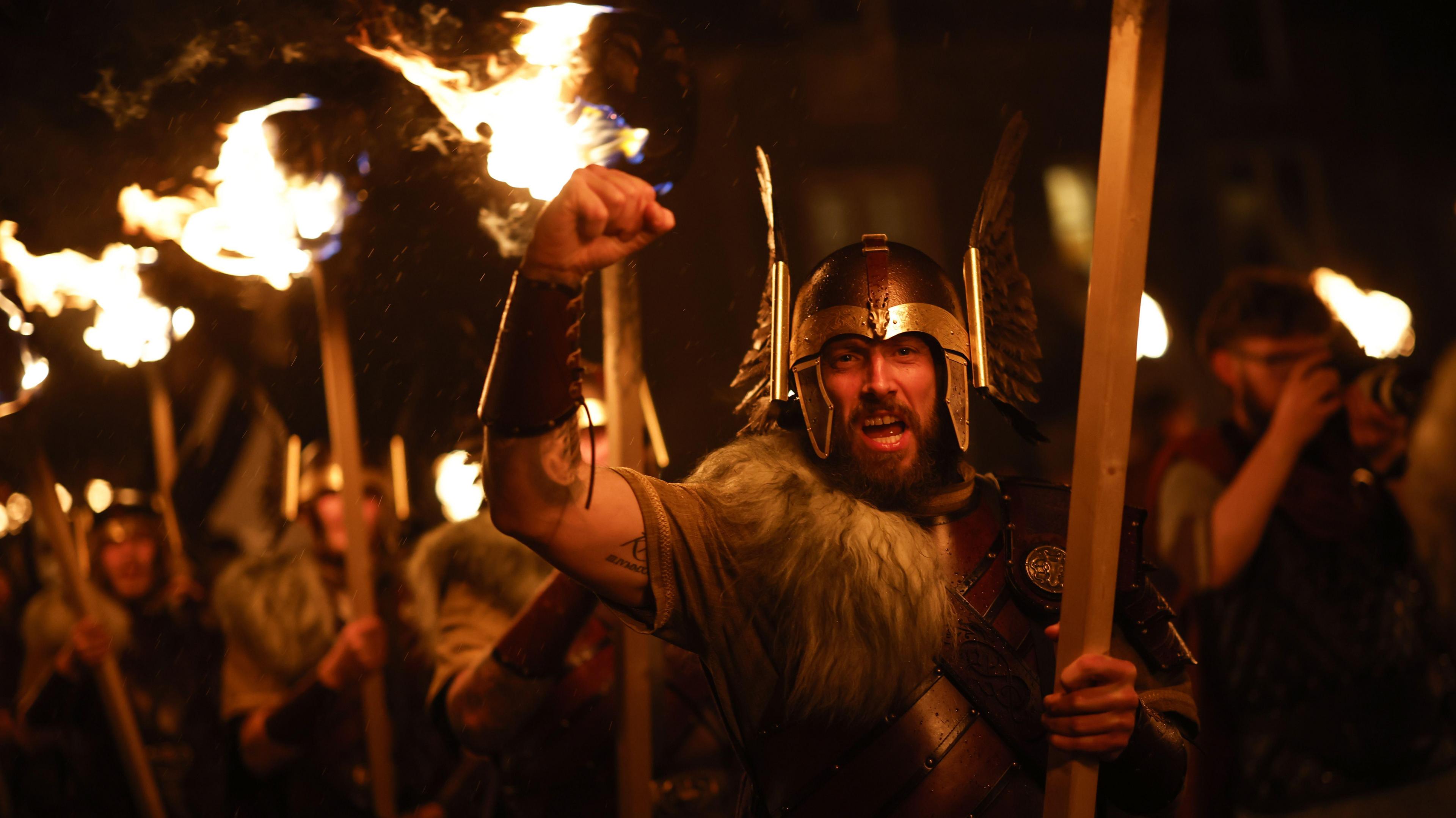 jarl sued with flaming torches at up Helly Aa fire festival