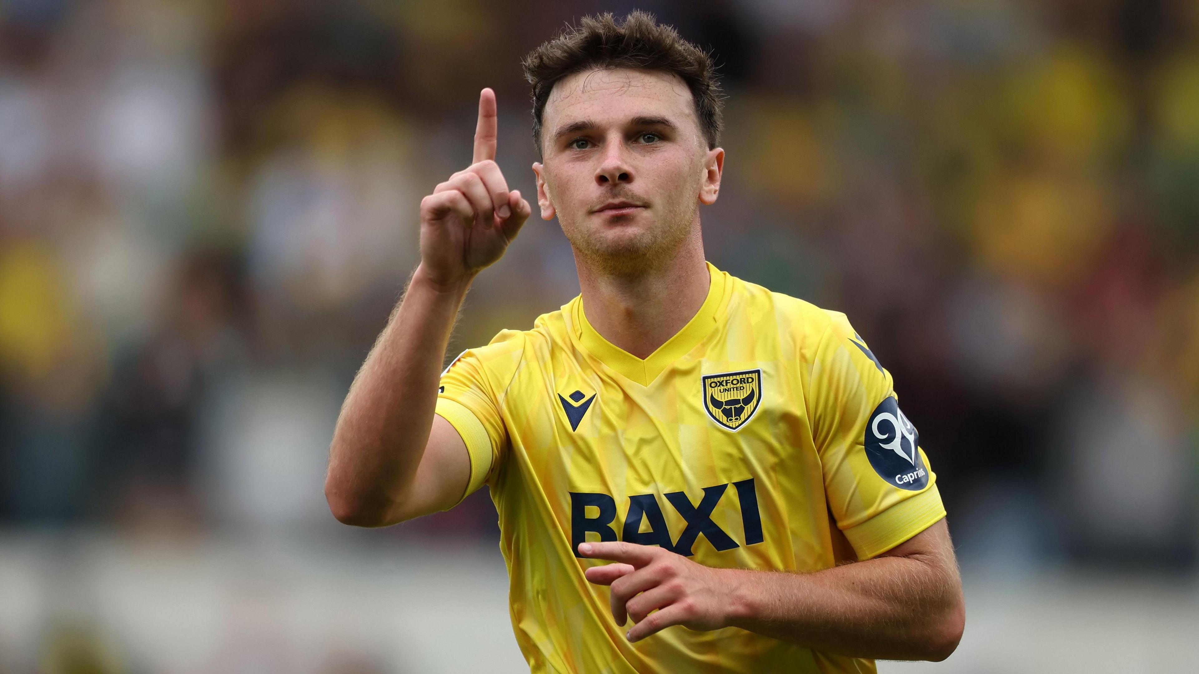 Mark Harris celebrates a goal for Oxford