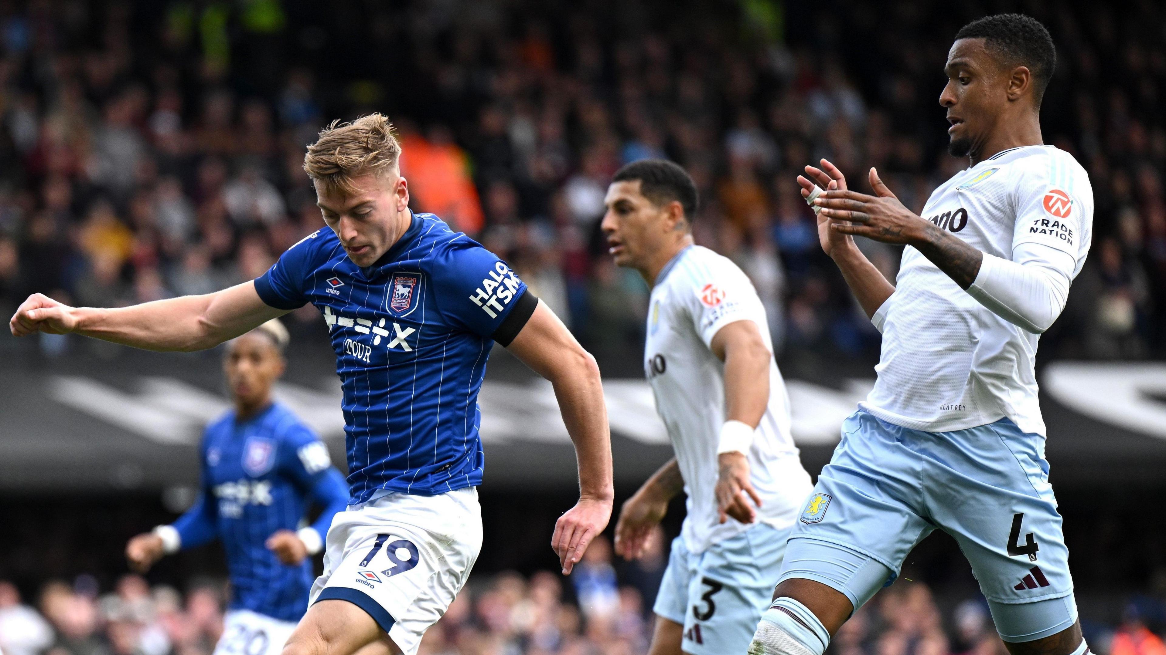 Liam Delap gets ahead of Ezri Konsa to score for Ipswich in Sunday's draw.